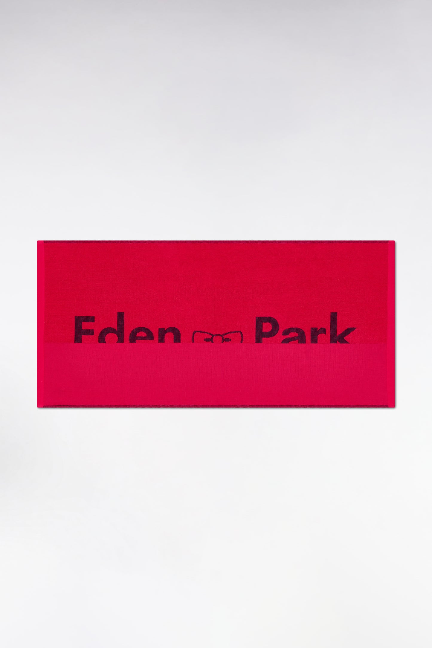 Drap de plage en coton éponge fuchsia jacquard Eden Park noir