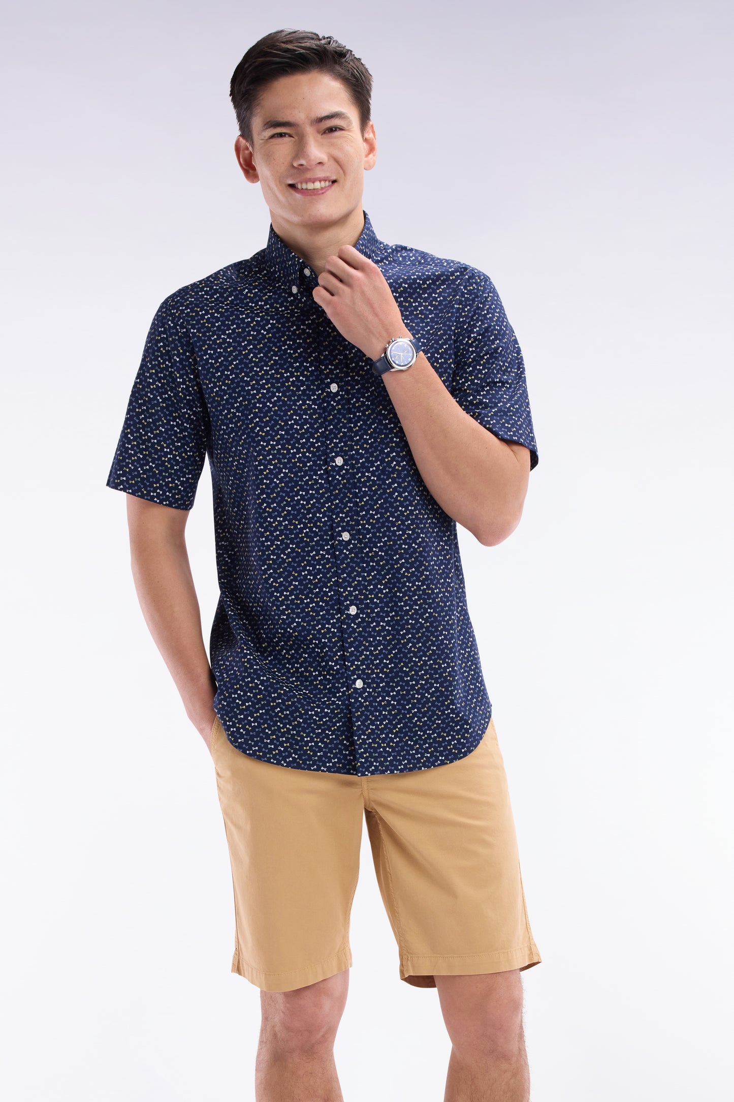Straight short-sleeved dark grey shirt in cotton poplin with multicolored bow tie print