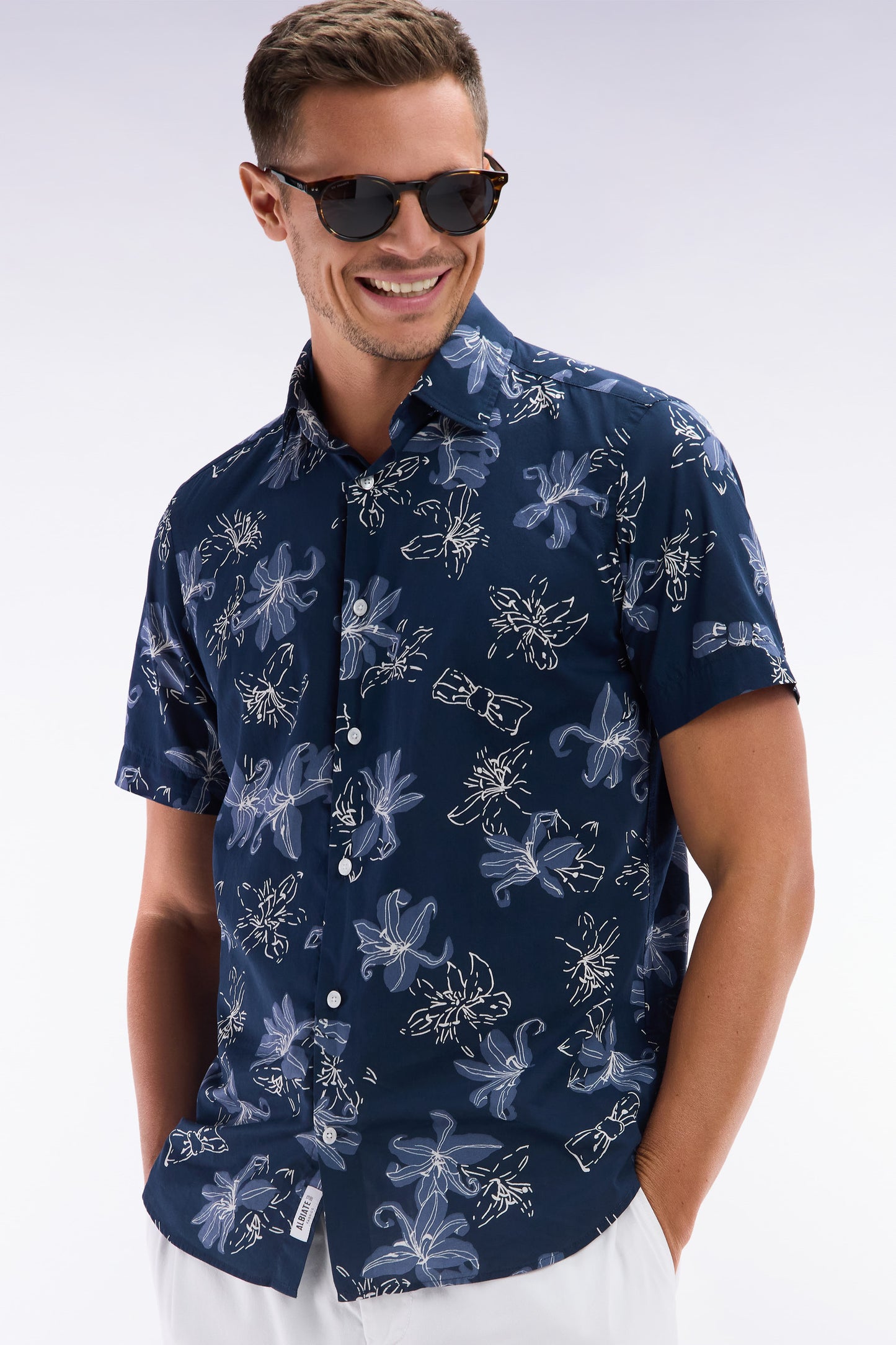 Slim-fit short-sleeved navy cotton shirt with floral print