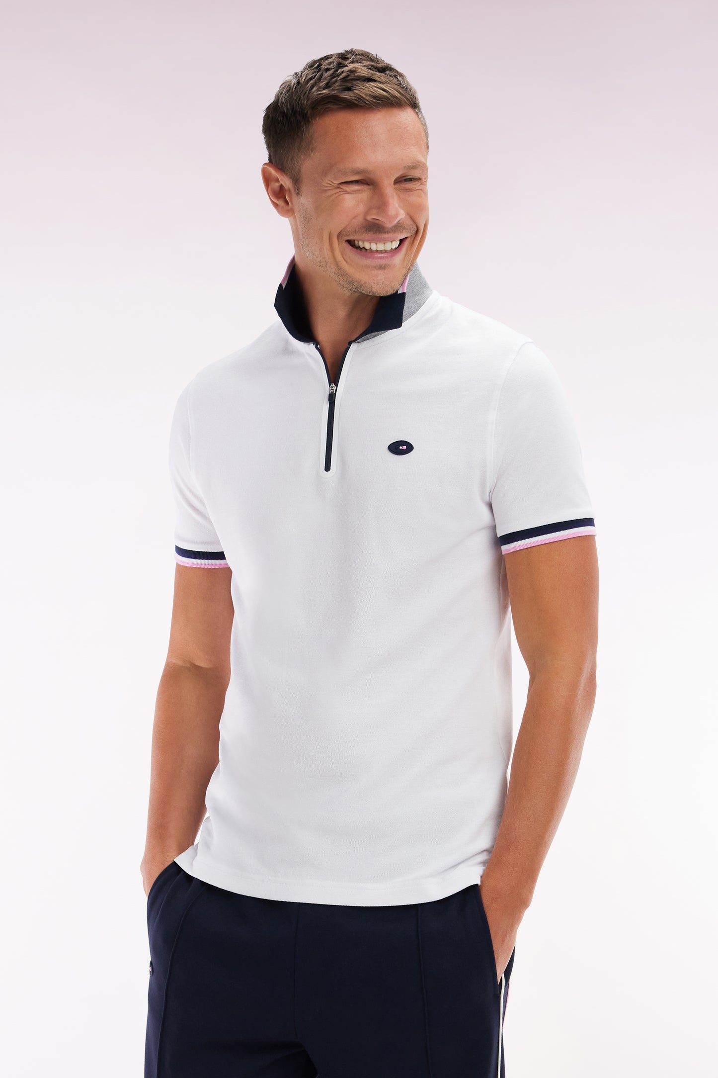 Slim-fit short-sleeved polo shirt in white stretch cotton with zipped collar