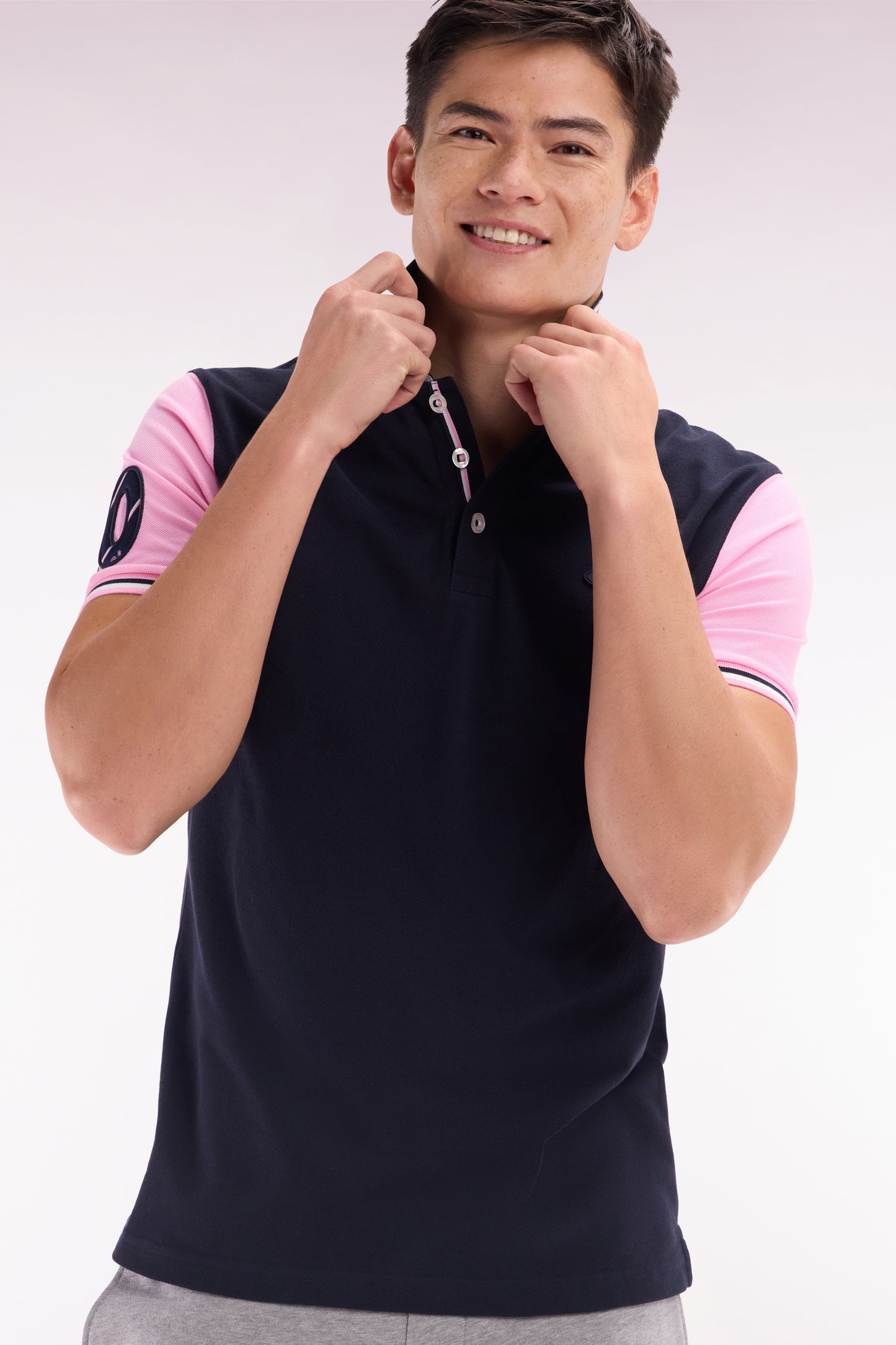 Straight-fit short-sleeved polo shirt in navy cotton piqué with 10 embroidery