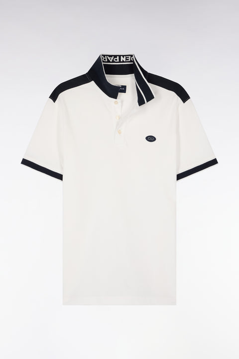 Polo à manches courtes en piqué coton blanc à découpes marine - Image 2
