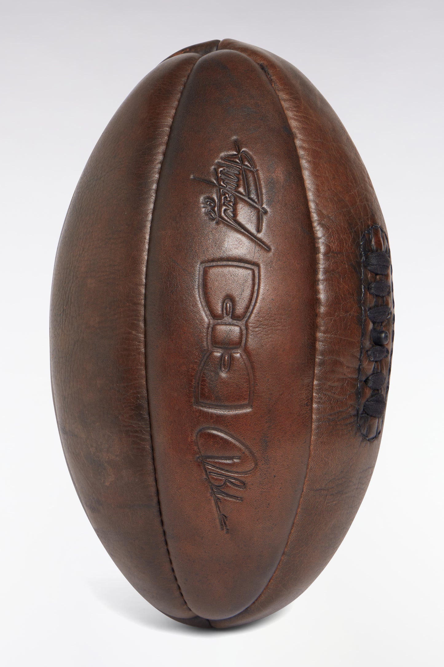 Brown cowhide rugby ball