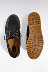 Boat shoes in smooth black leather with beige soles