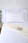 Set of rectangular pillowcases in white cotton with striped sky border