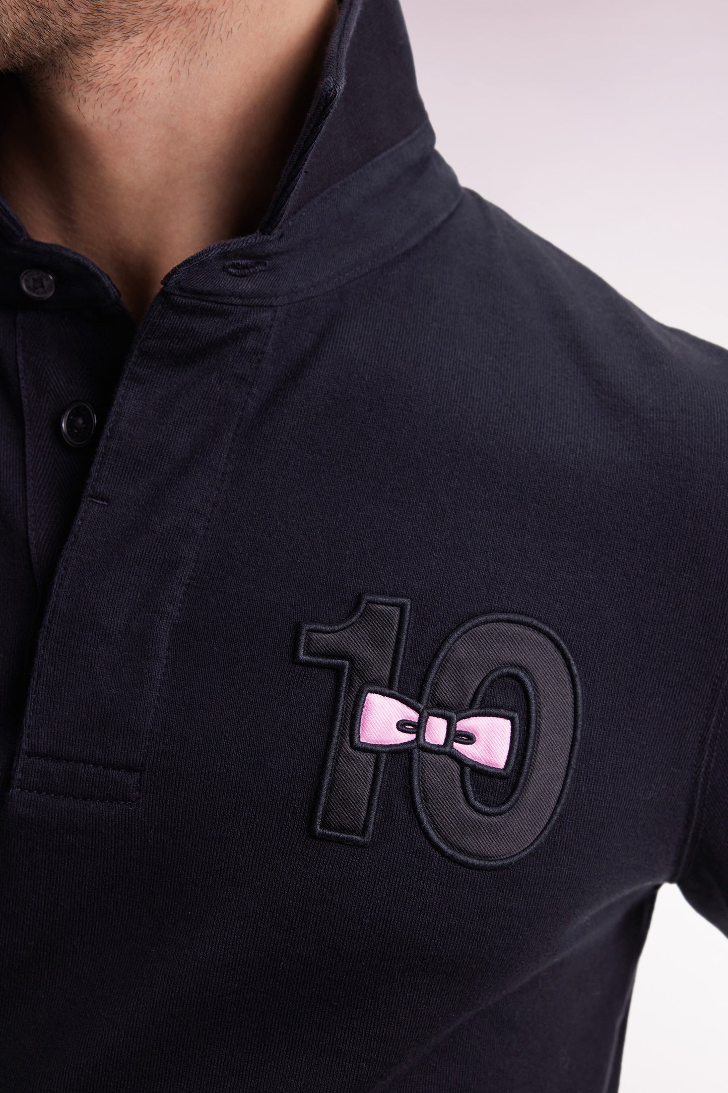 Long-sleeved jersey in thick black embroidered cotton jersey, straight cut