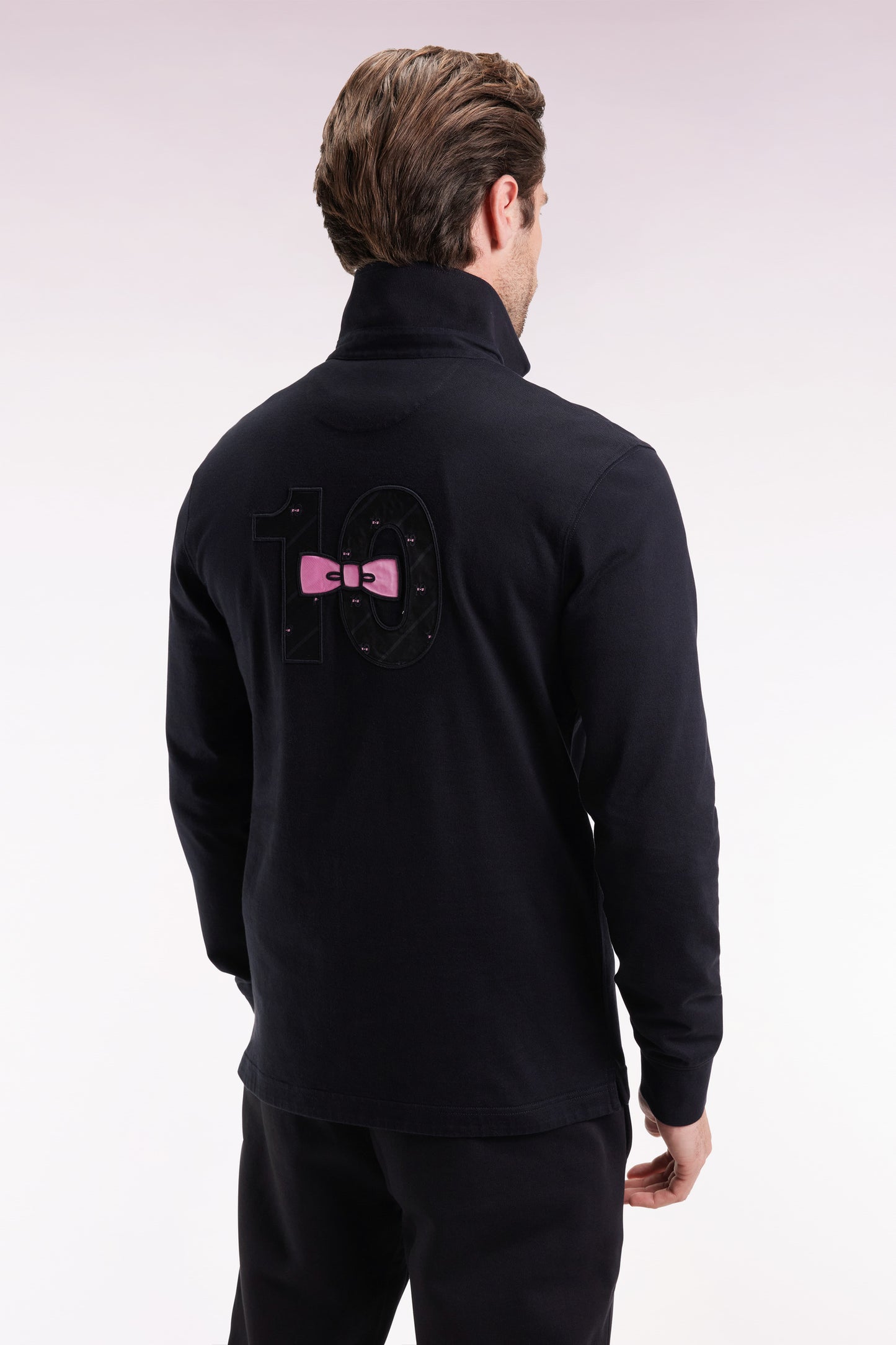 Long-sleeved jersey in thick black cotton jersey with bow tie embroidery, straight cut