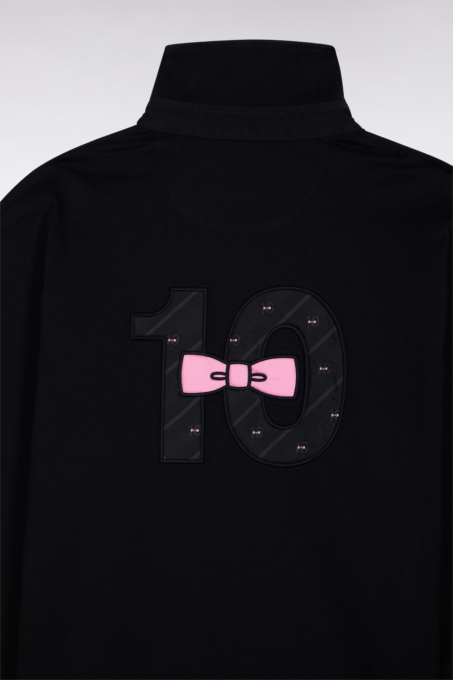 Long-sleeved jersey in thick black cotton jersey with bow tie embroidery, straight cut