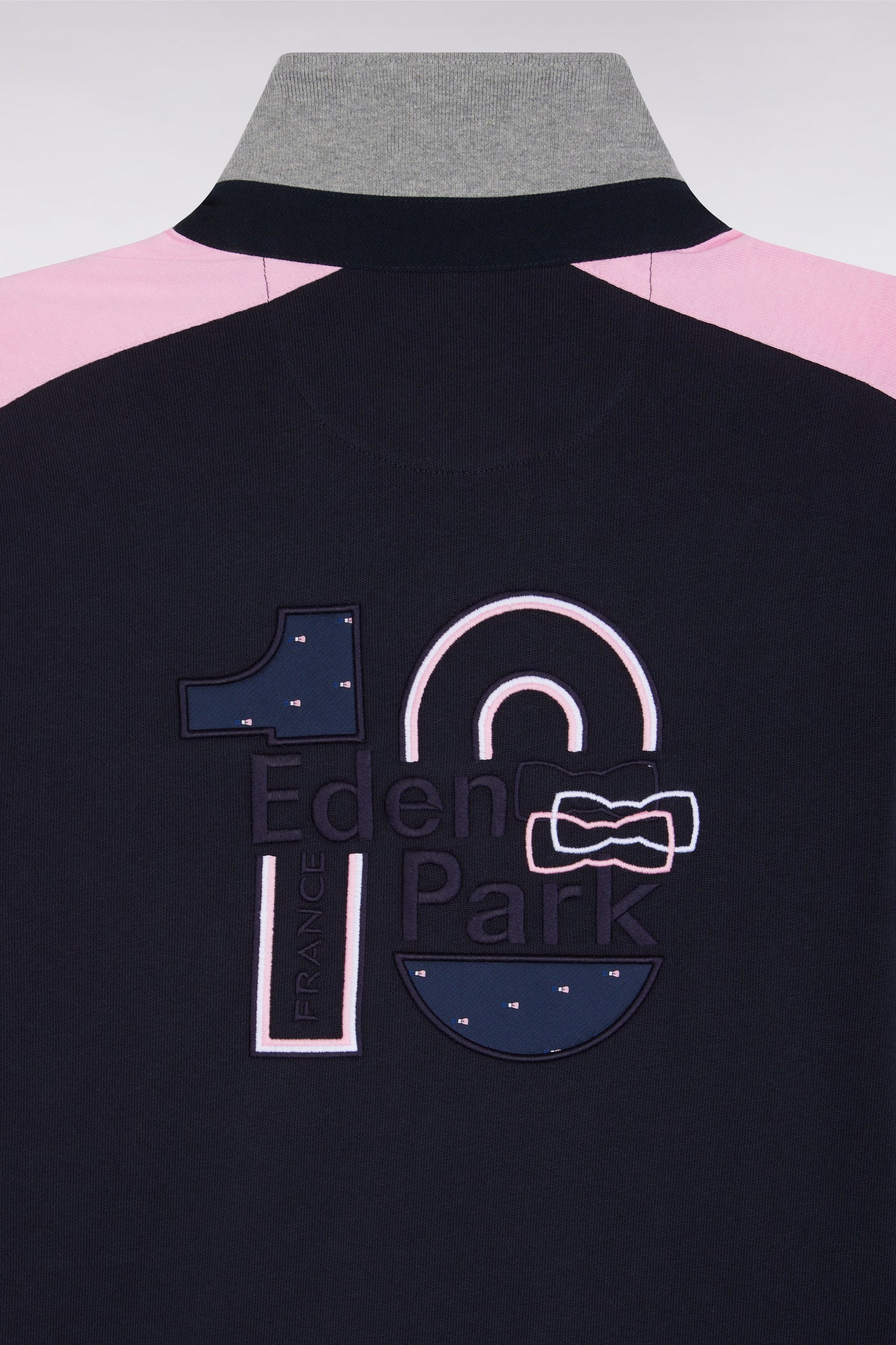 Navy embroidered long-sleeved jersey with tricolour cut-out sleeves, straight cut