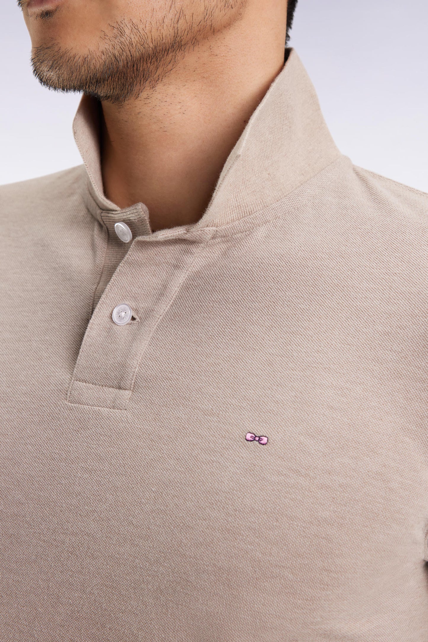 Polo manches courtes en coton chiné beige coupe droite