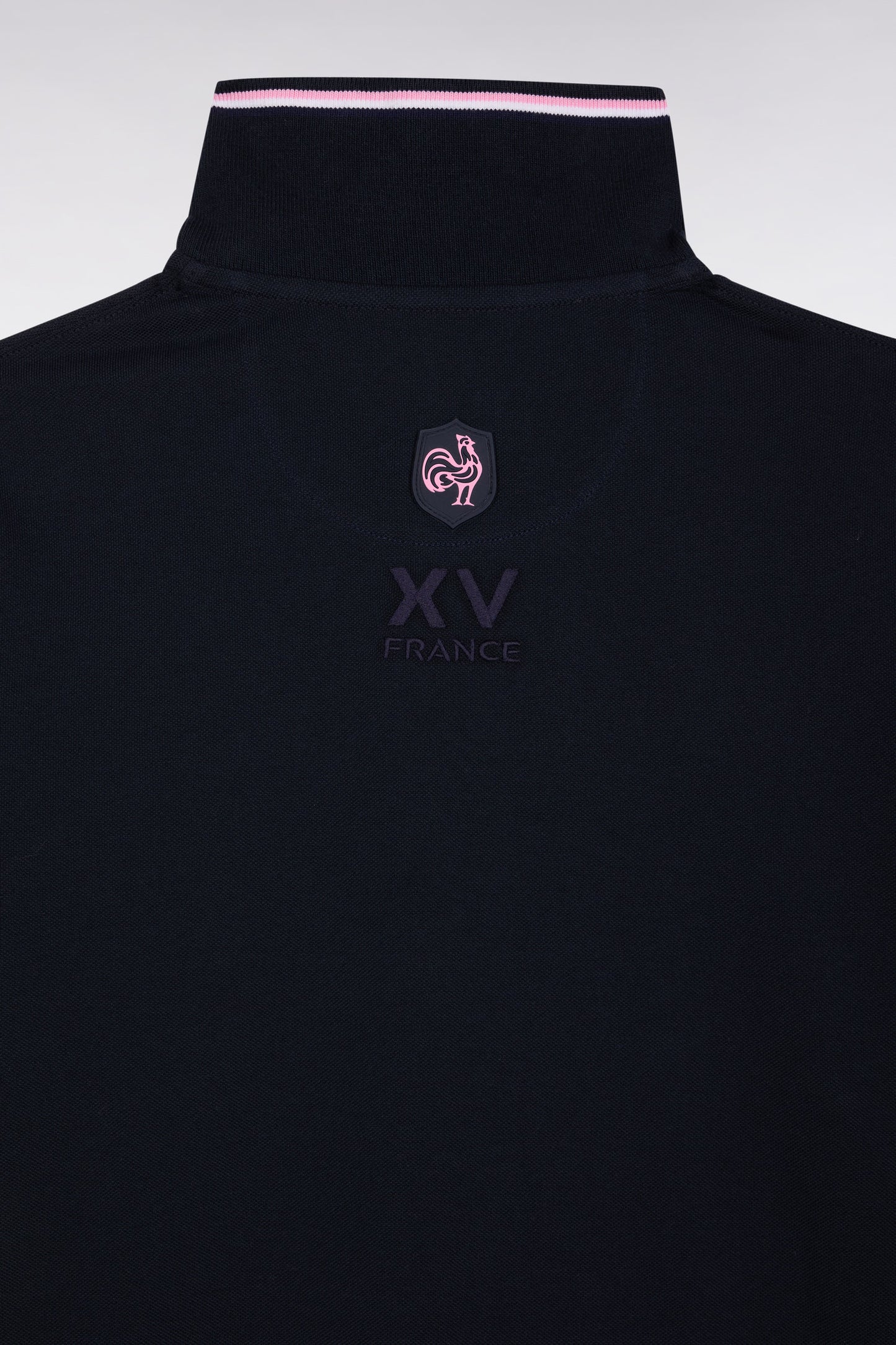 Short-sleeved navy polo shirt with tricolored trim, straight cut
