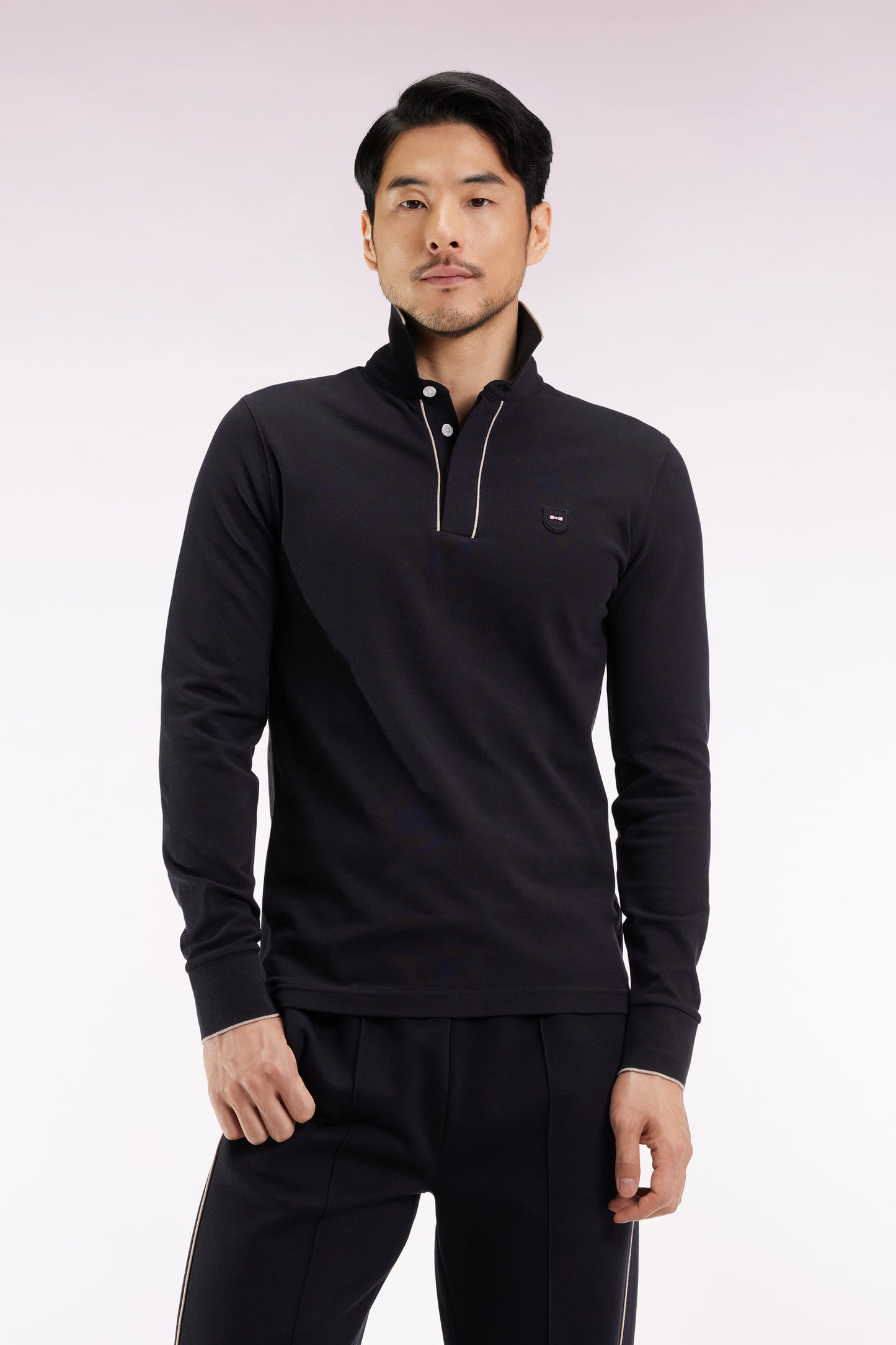 Polo à manches longues en coton stretch noir passepoilé coupe slim
