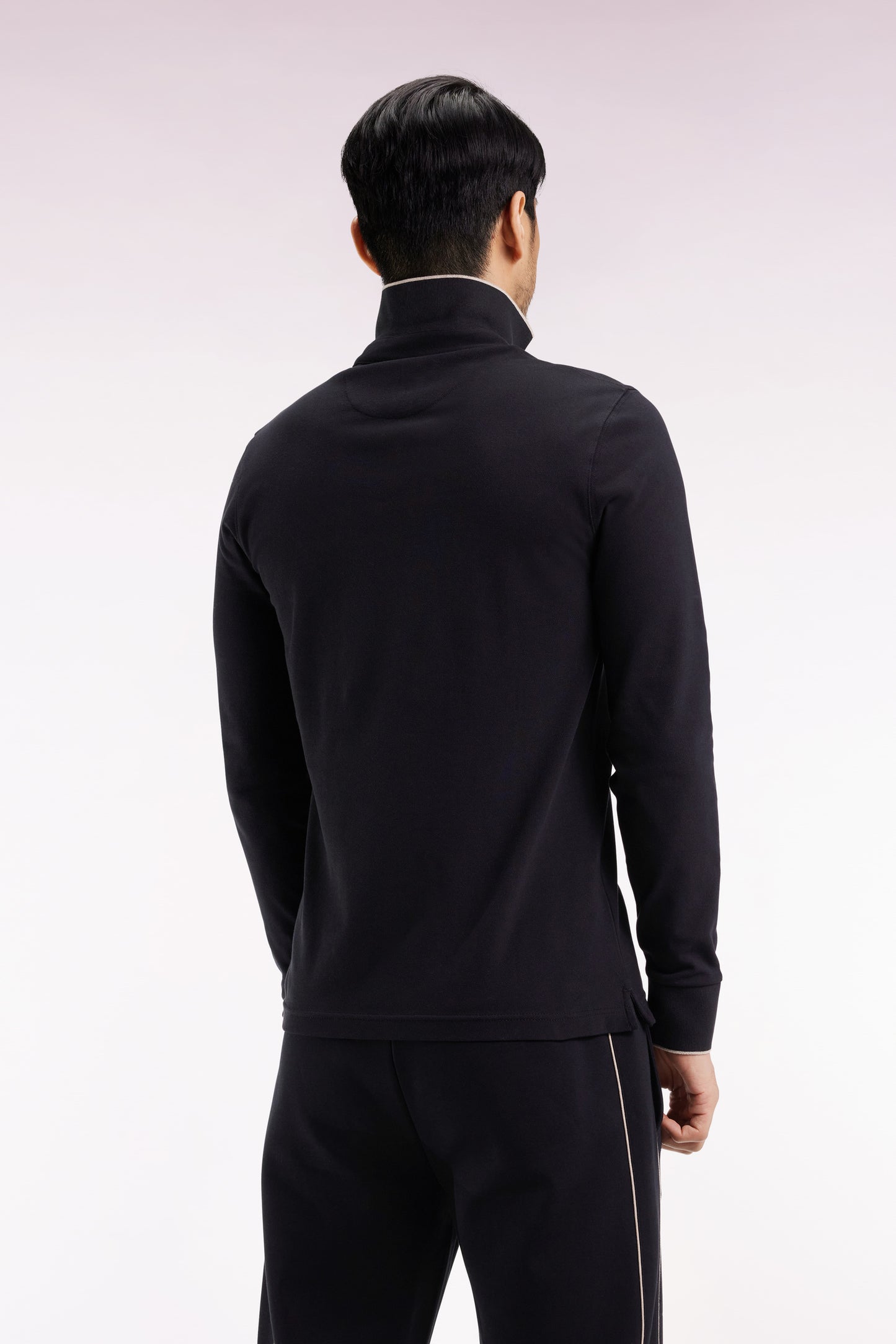 Polo à manches longues en coton stretch noir passepoilé coupe slim