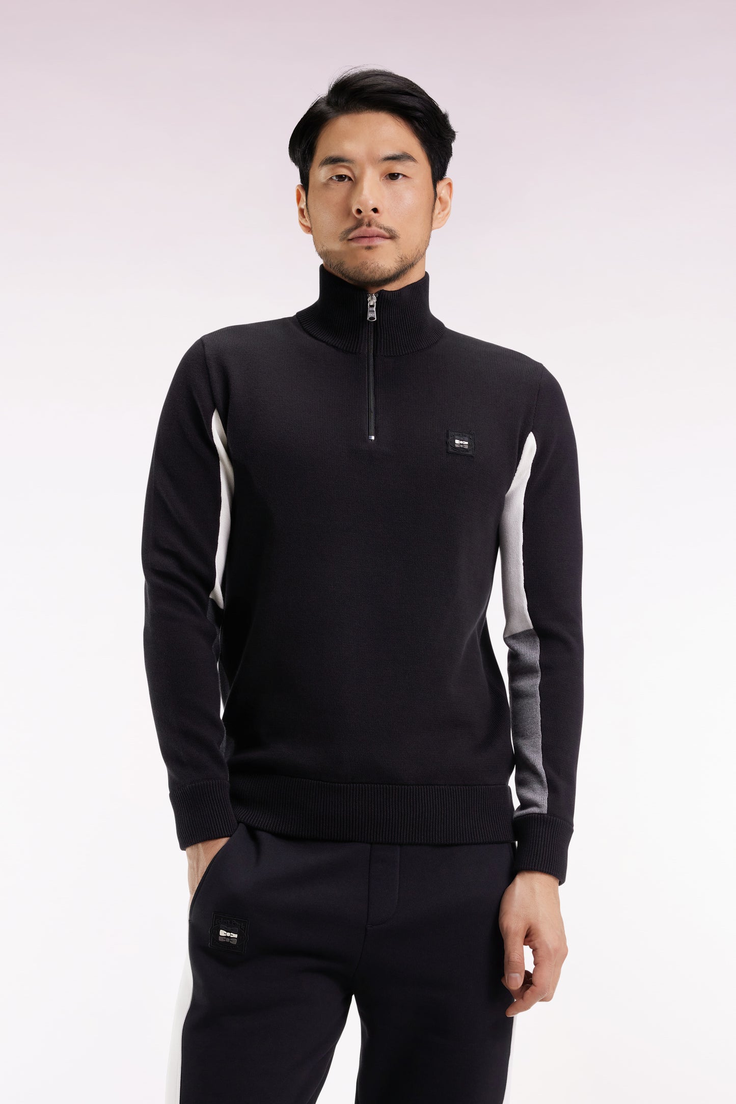 Truck-neck sweater in black cotton with three-tone contrasting sleeves