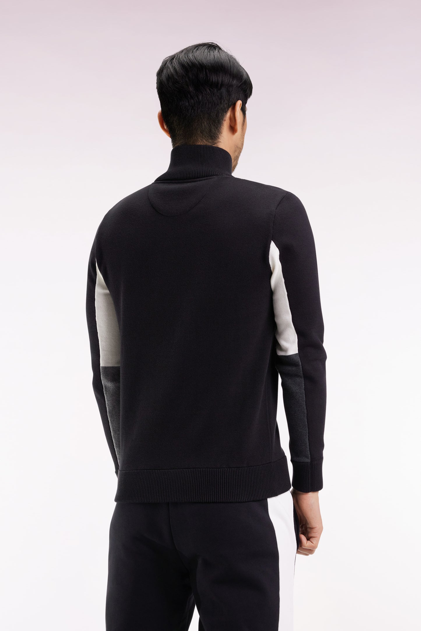 Truck-neck sweater in black cotton with three-tone contrasting sleeves