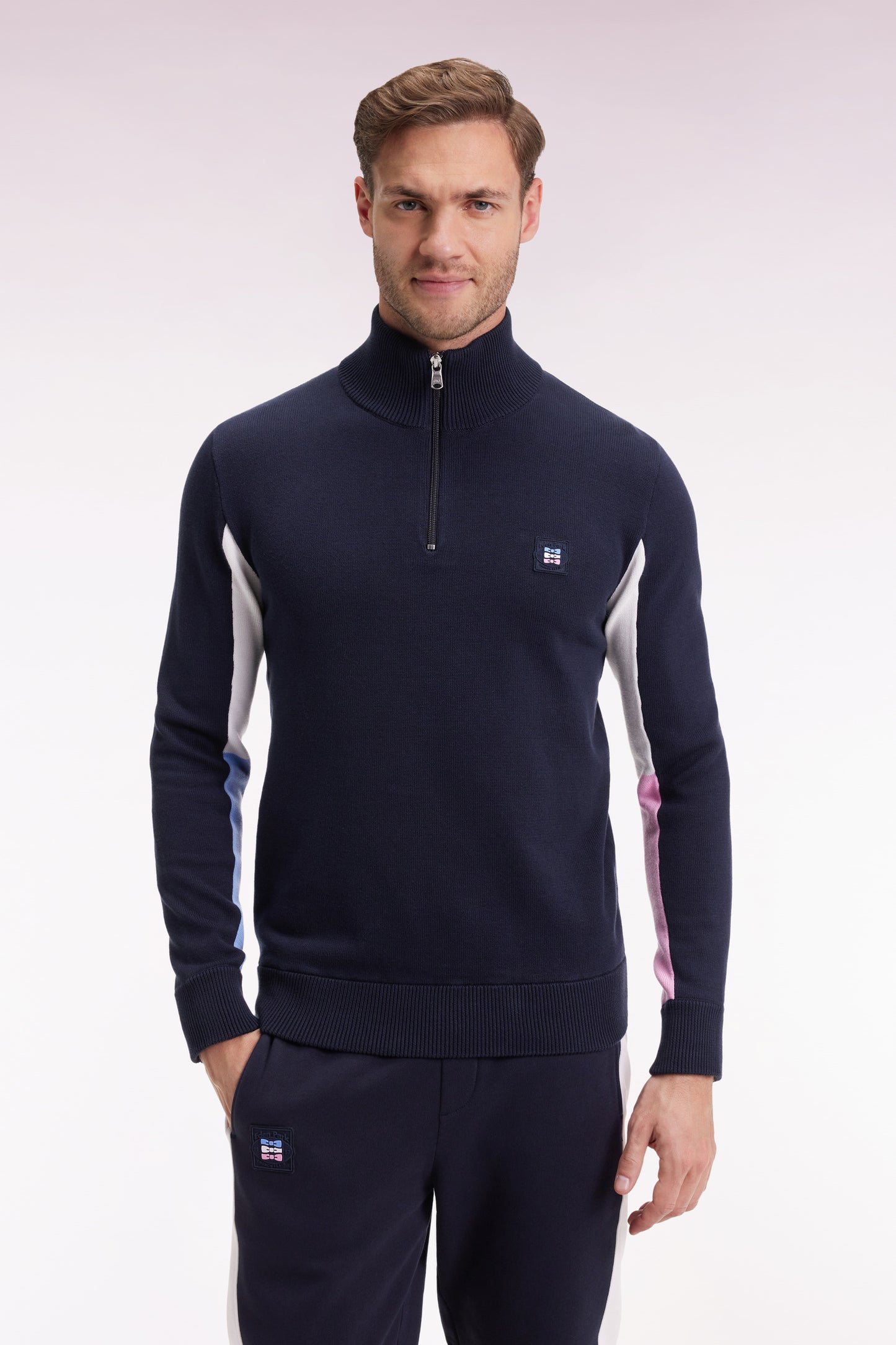 Truck-neck sweater in black cotton with contrasting grey sleeves