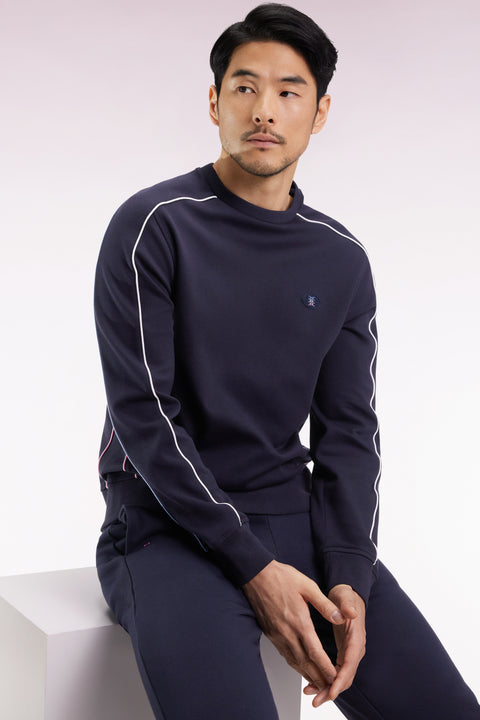 Navy fleece sweatshirt with colored piping - Image 1