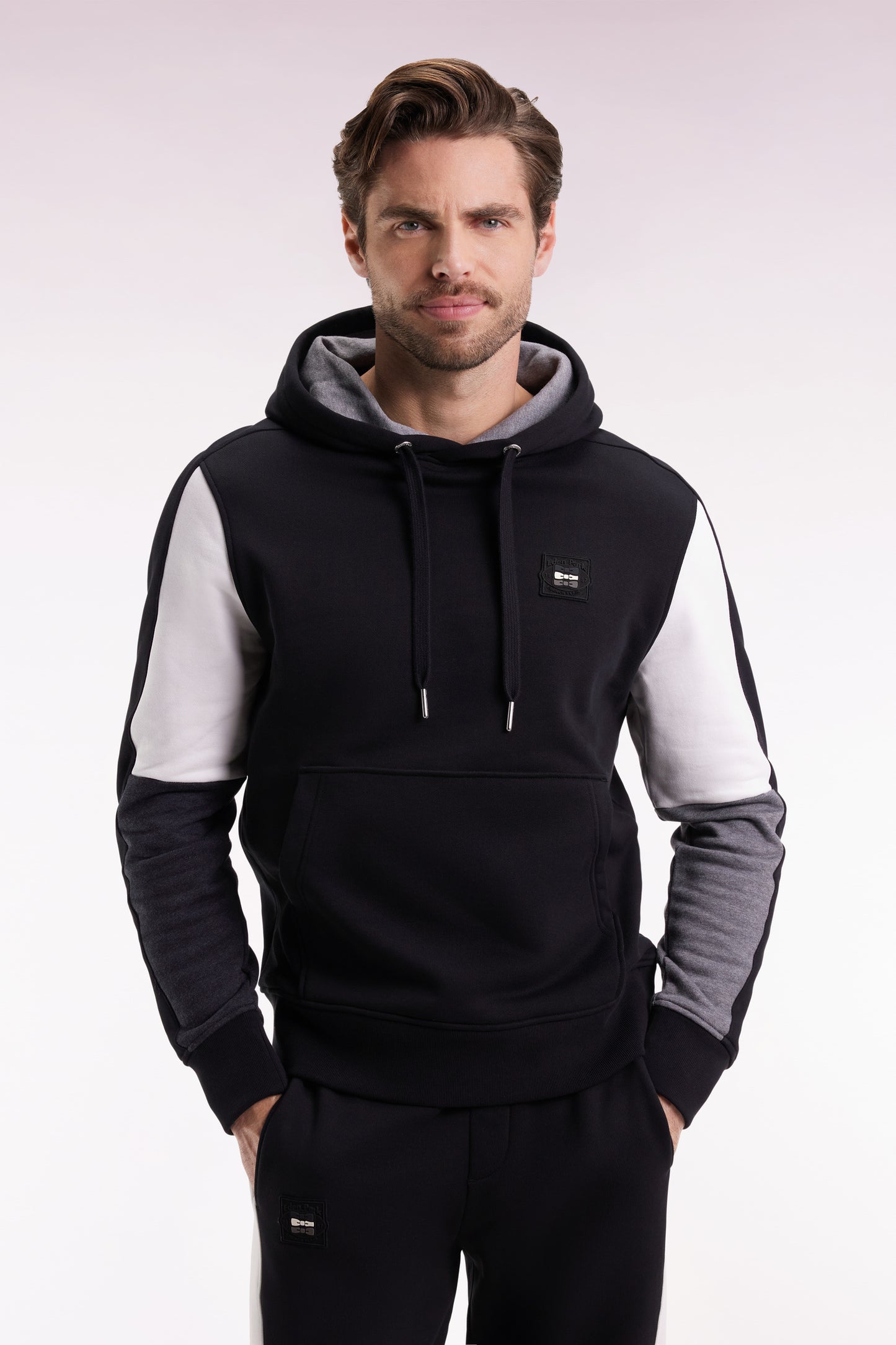 Black hooded sweatshirt with contrasting cut-out sleeves