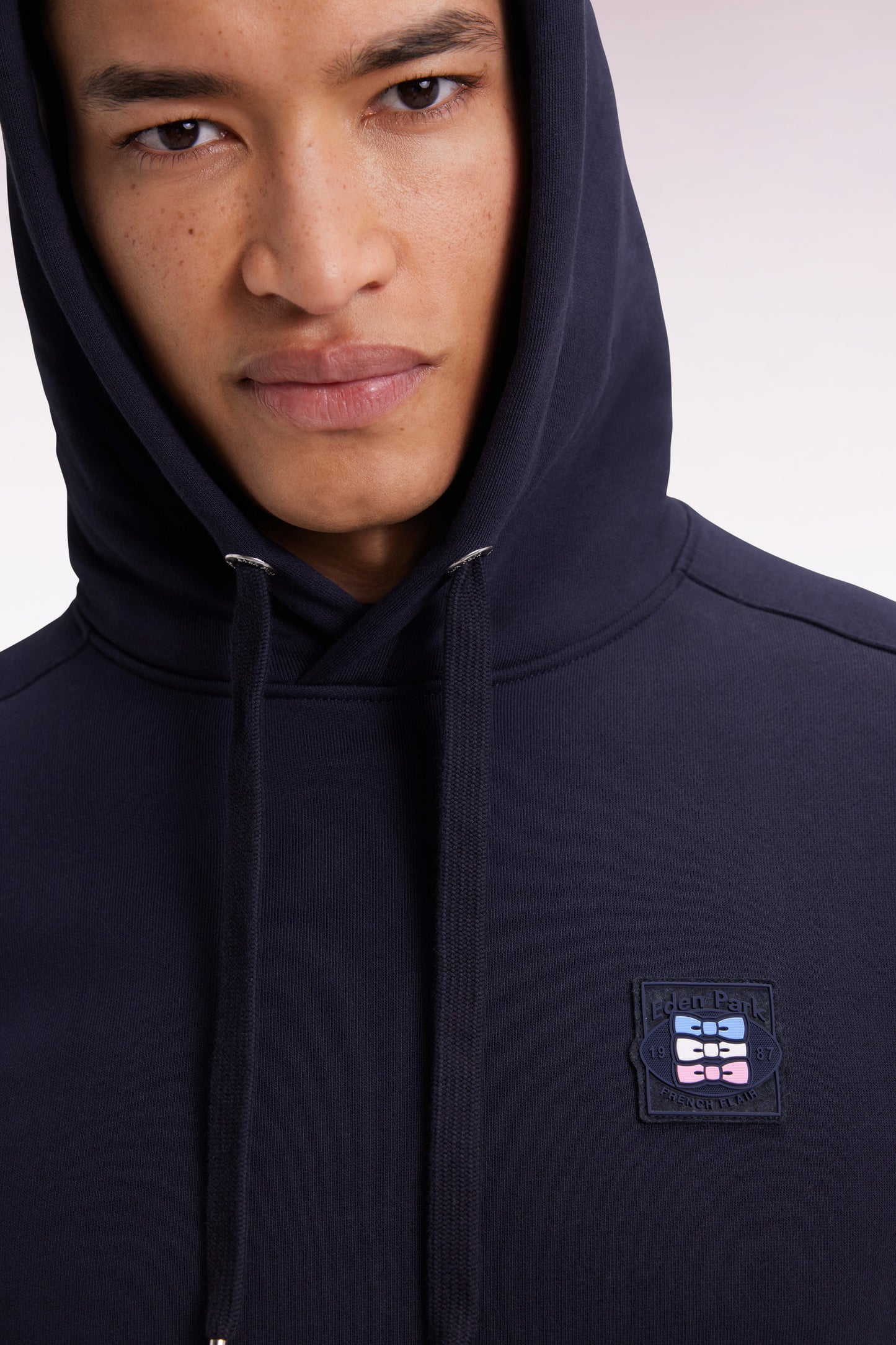 Navy hooded sweatshirt with contrasting cut-out sleeves