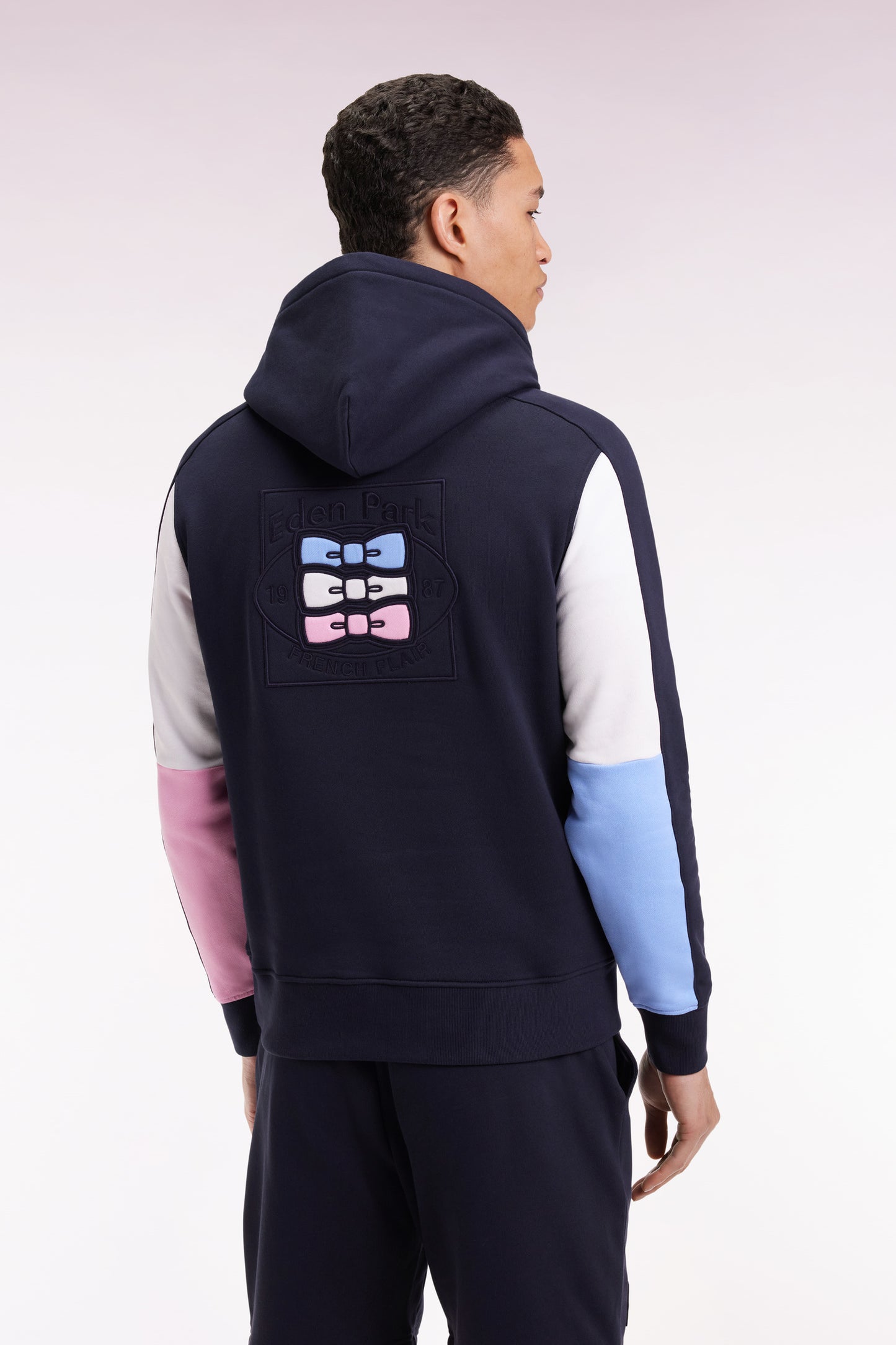 Navy hooded sweatshirt with contrasting cut-out sleeves