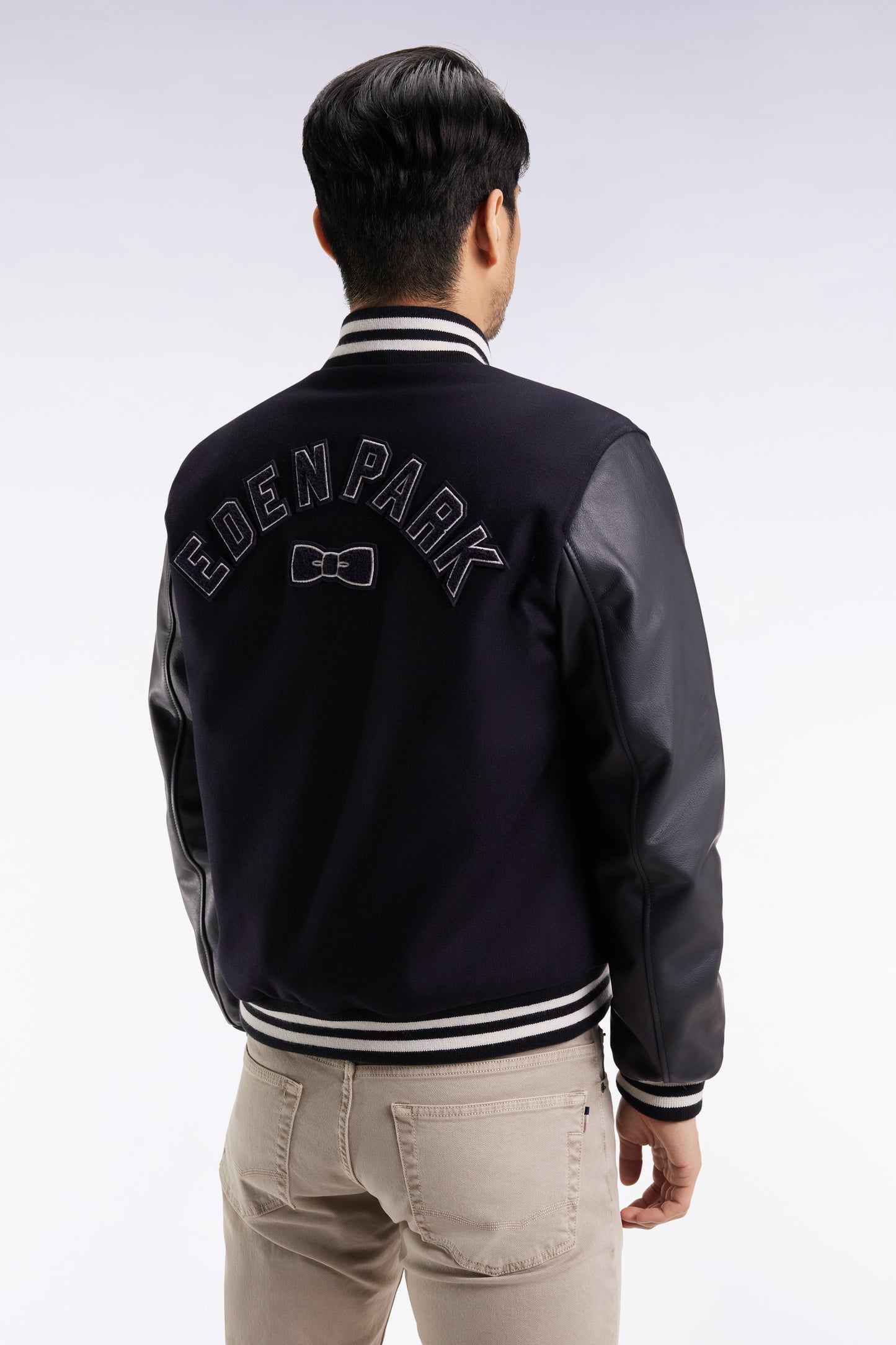 Two-tone teddy jacket with navy leather sleeves