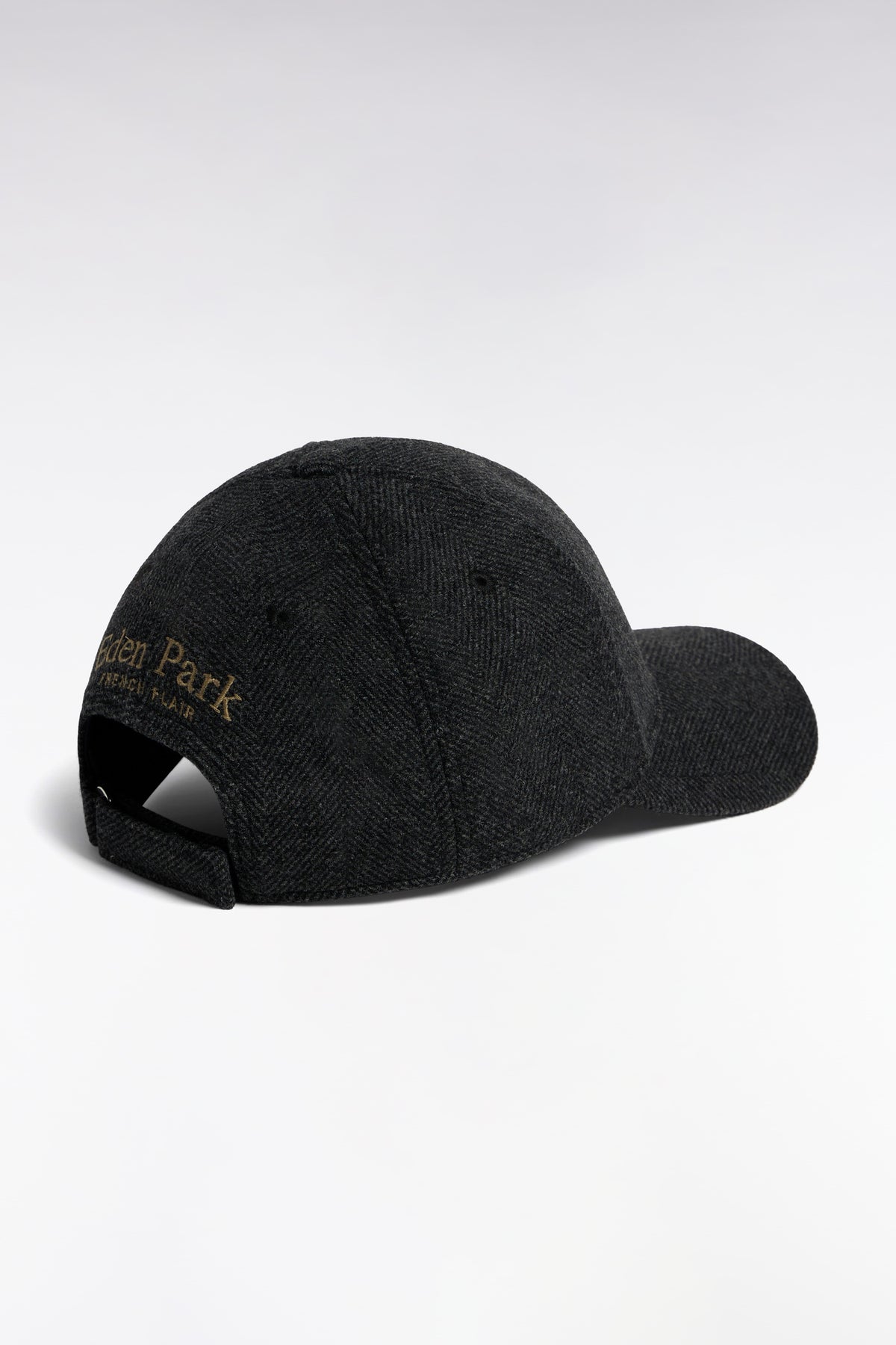 Charcoal herringbone woolen cloth cap with crest patch