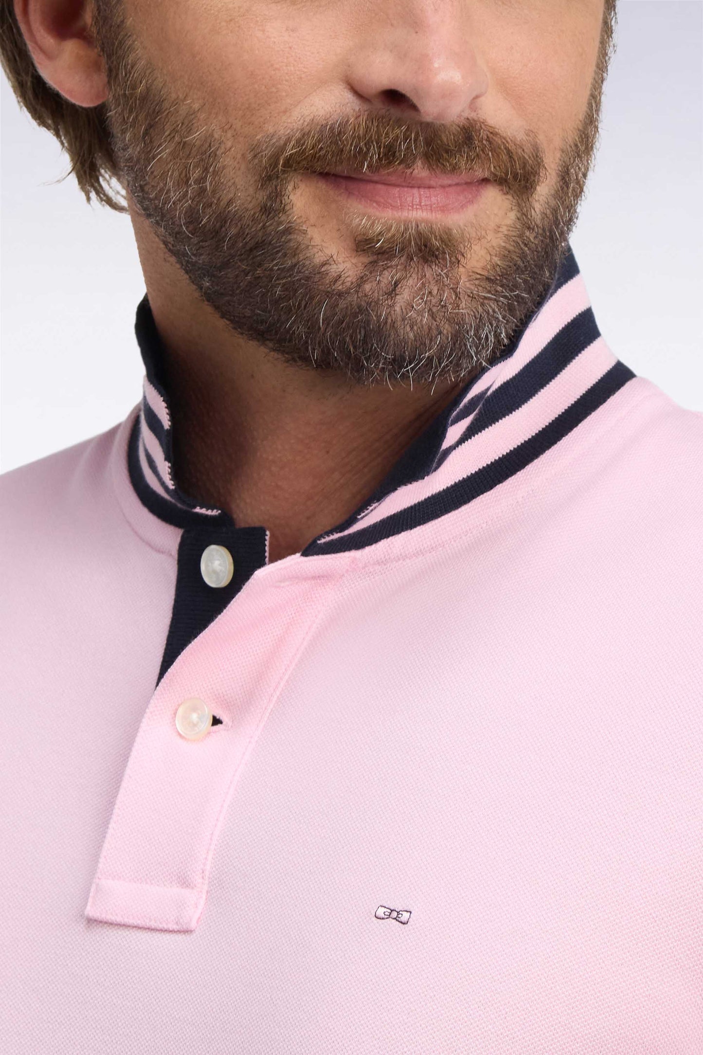 Polo manches courtes sous-col rayé en coton Pima rose coupe droite