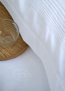 Comforter cover in white cotton percale with sky stripe border