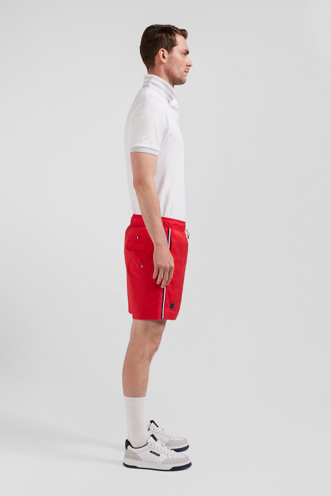 Swim shorts with tricoloured stripes