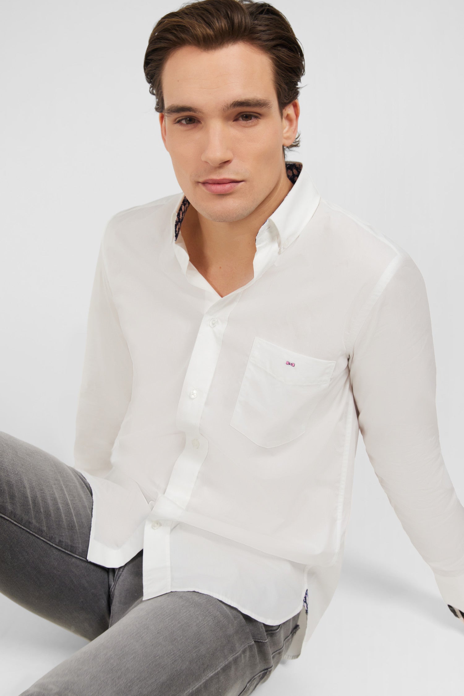 White shirt with floral elbow patches