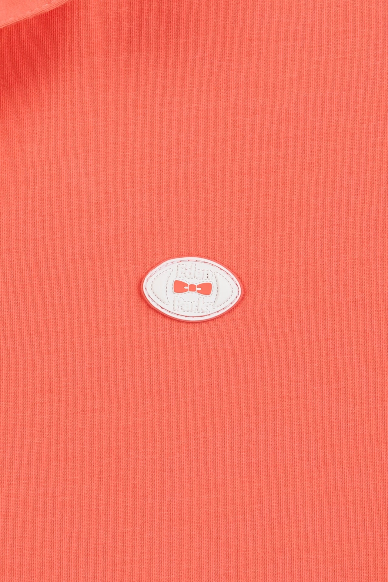 Pink short-sleeved polo shirt
