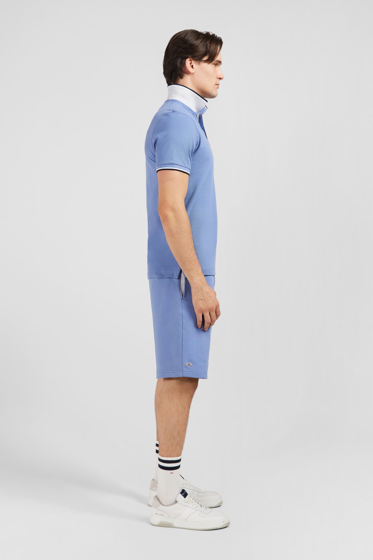 Plain light blue short-sleeved polo shirt