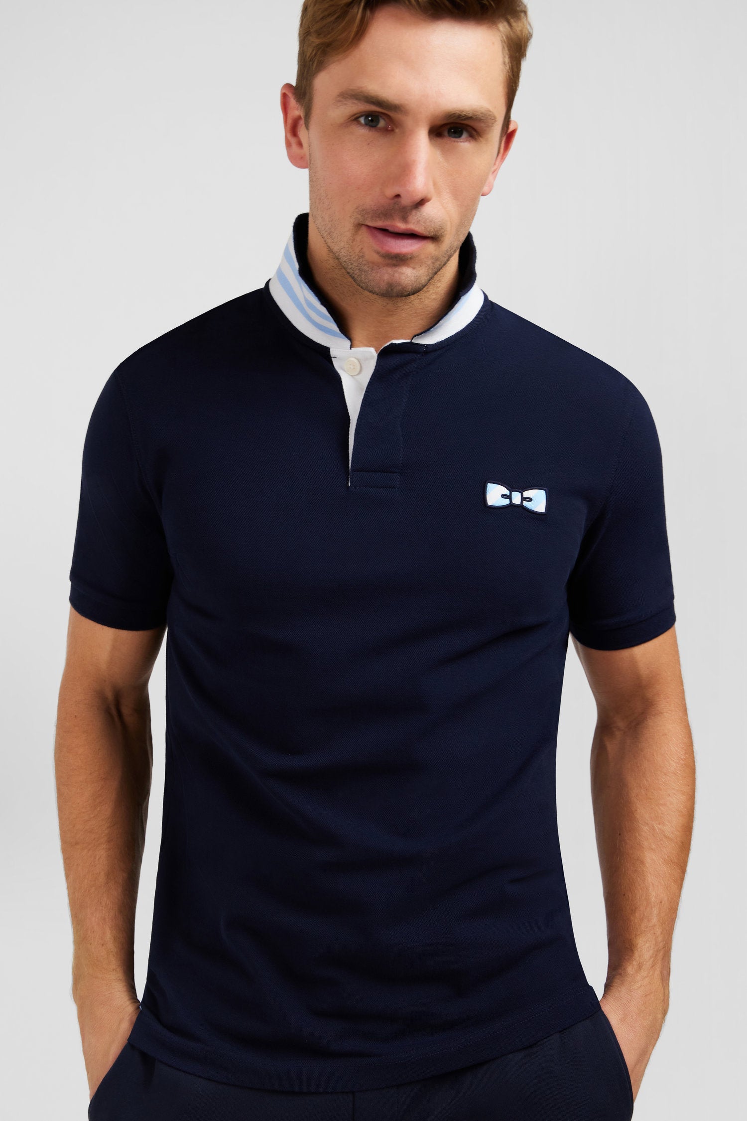 Navy blue short-sleeved polo shirt