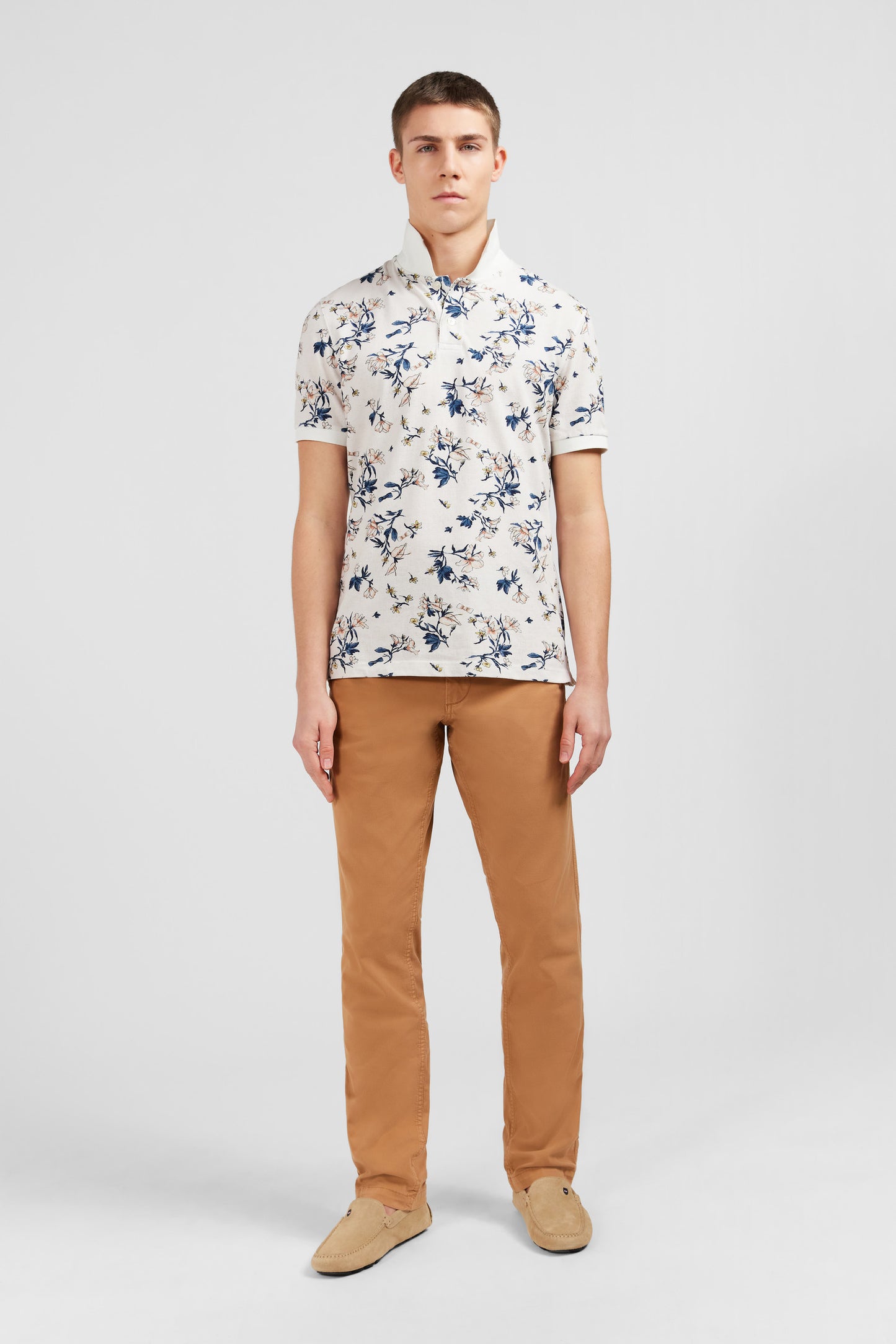 White polo shirt with an exclusive floral print