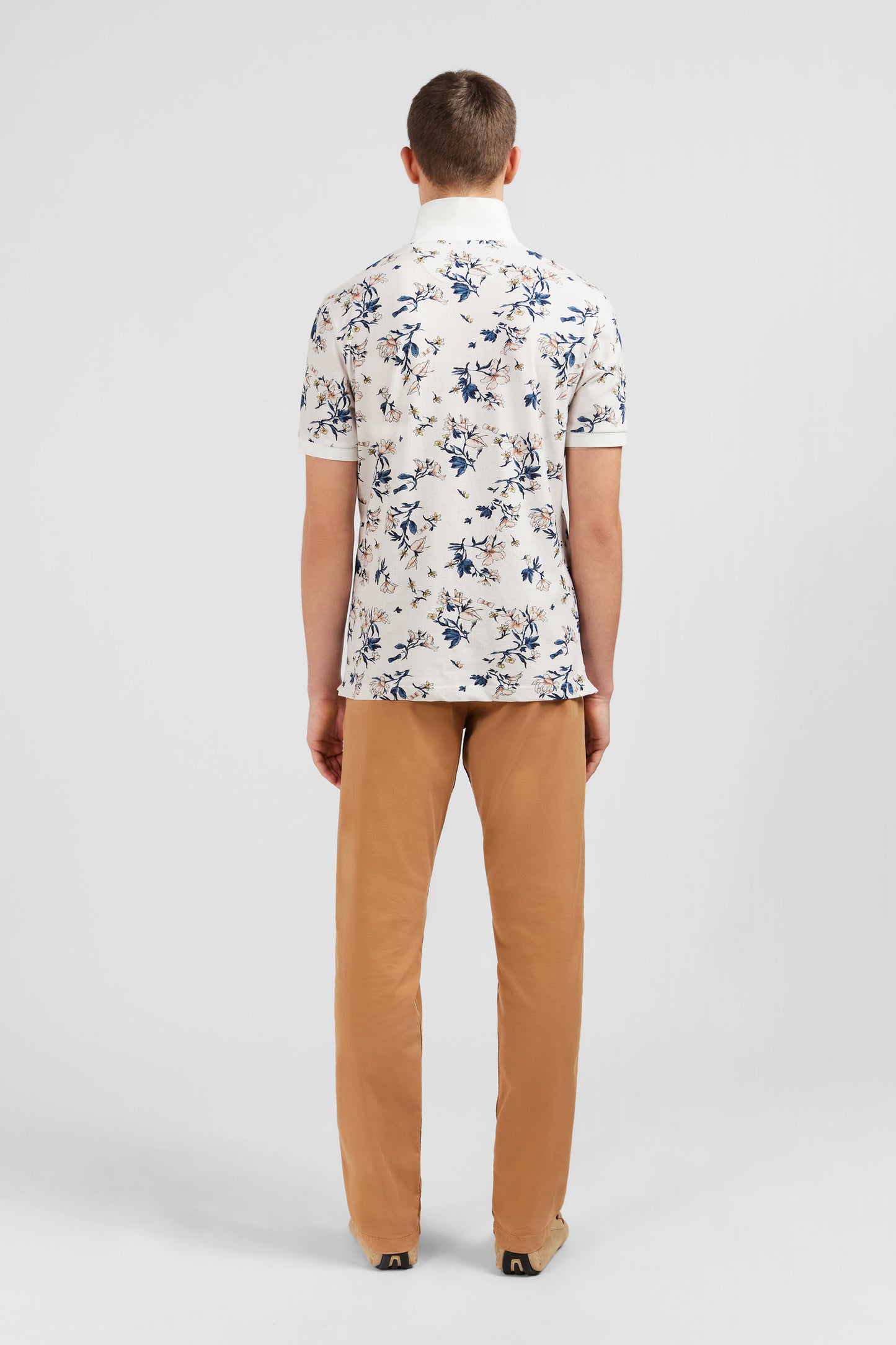 White polo shirt with an exclusive floral print