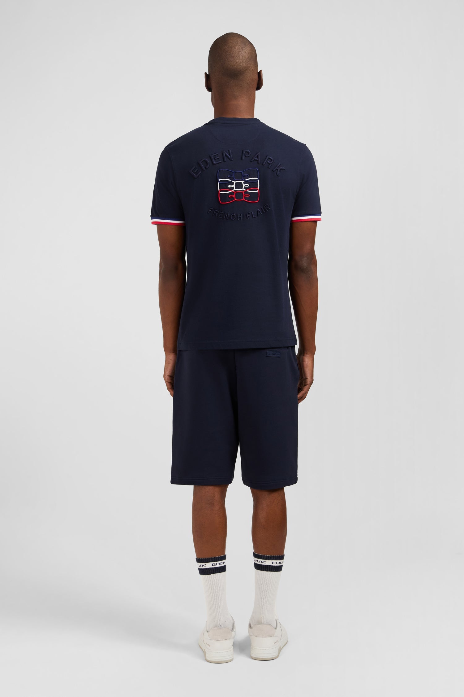 Navy blue short-sleeved T-shirt with embossed logo