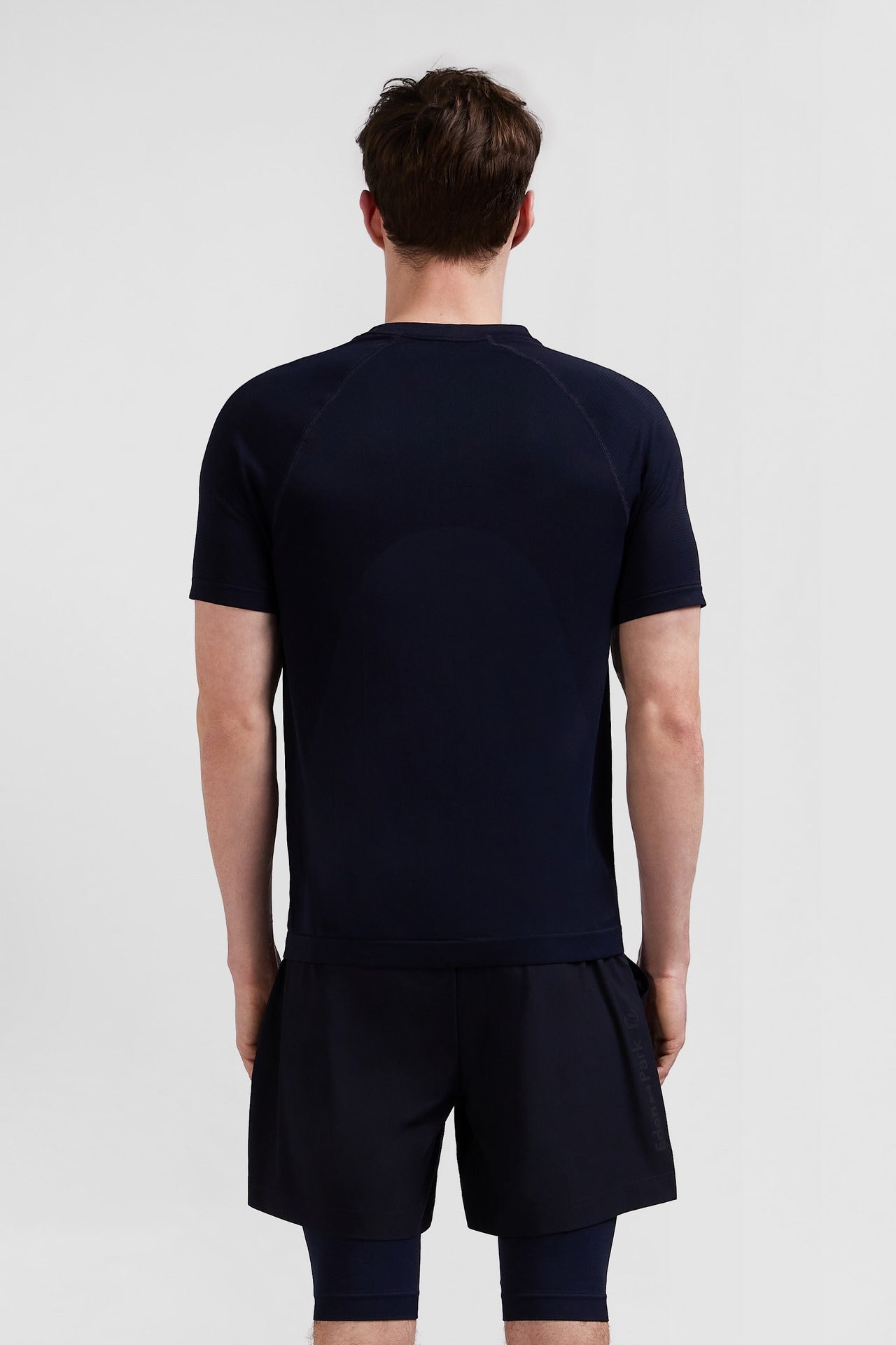 Navy blue short-sleeved sports T-shirt with striped details