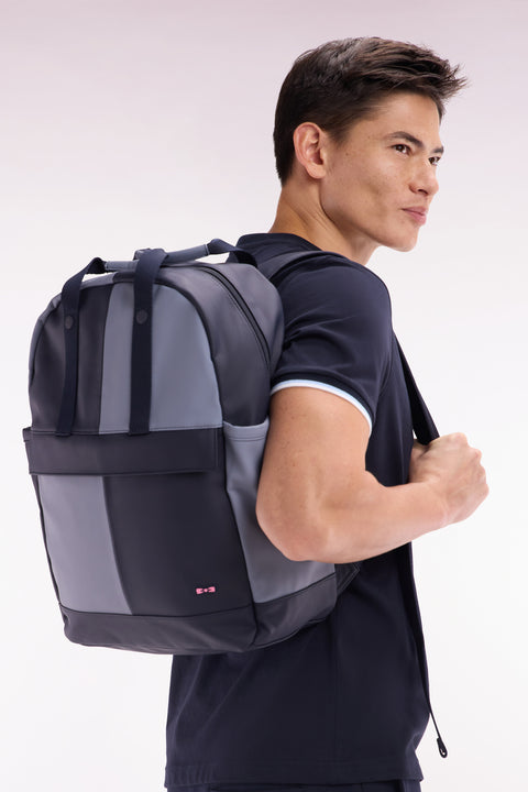 Cut and sew colorblock backpack in navy and grey rubber - Image 1