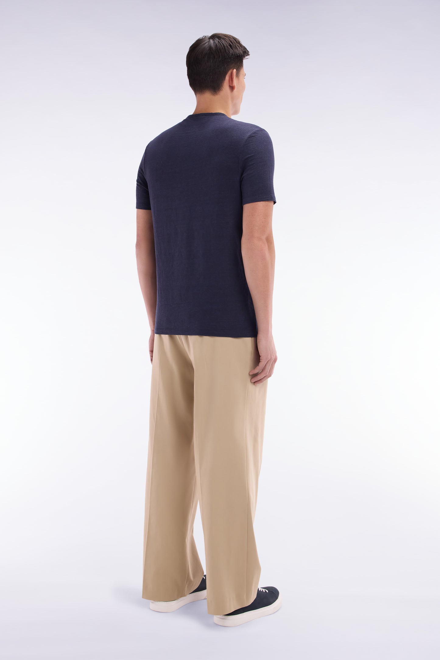 Wide-leg beige pleated trousers in stretch lyocell and cotton