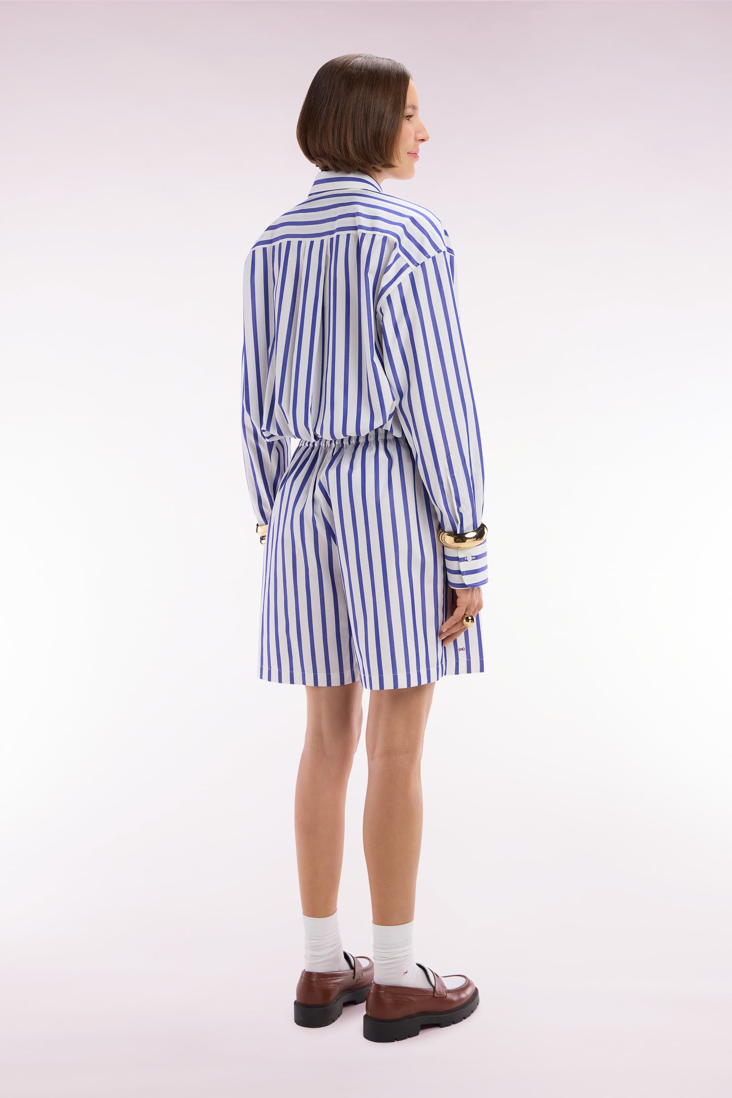 White oversized cotton shorts with blue stripes