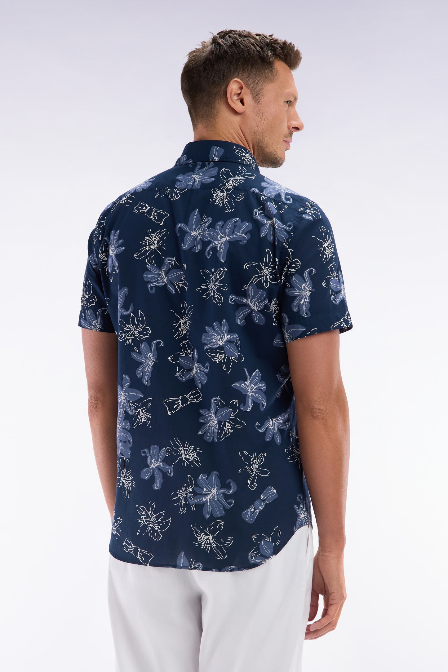 Slim-fit short-sleeved navy cotton shirt with floral print