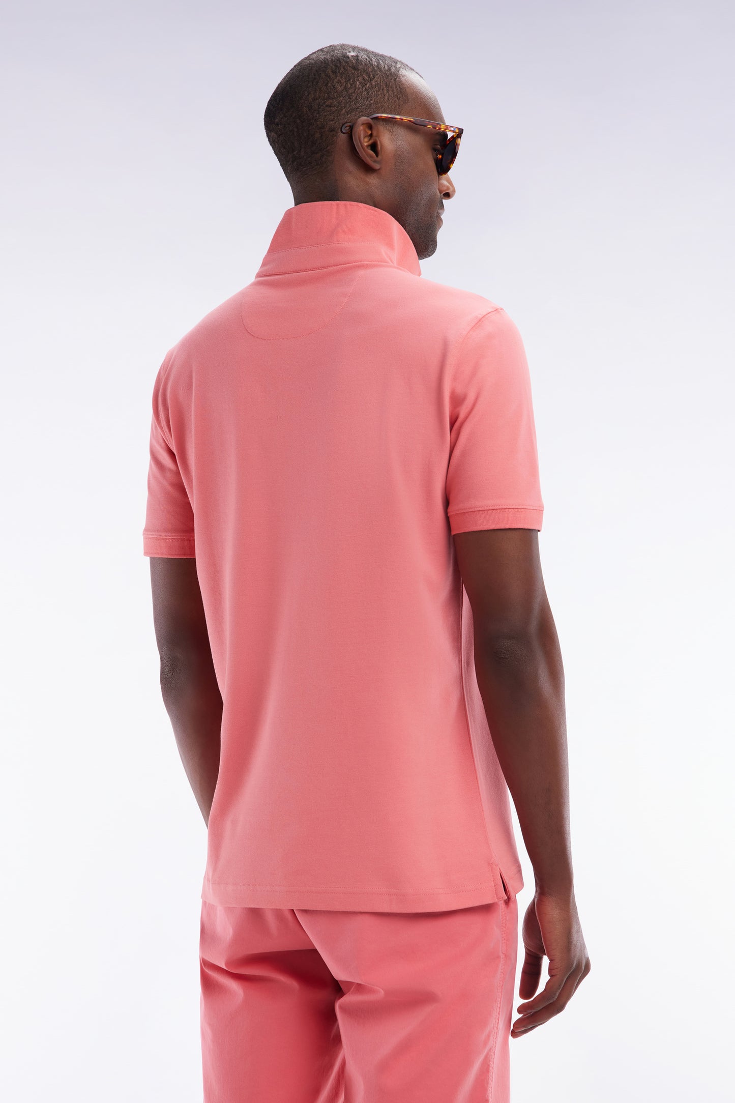 Slim-fit short-sleeved polo shirt in salmon pink stretch cotton piqué