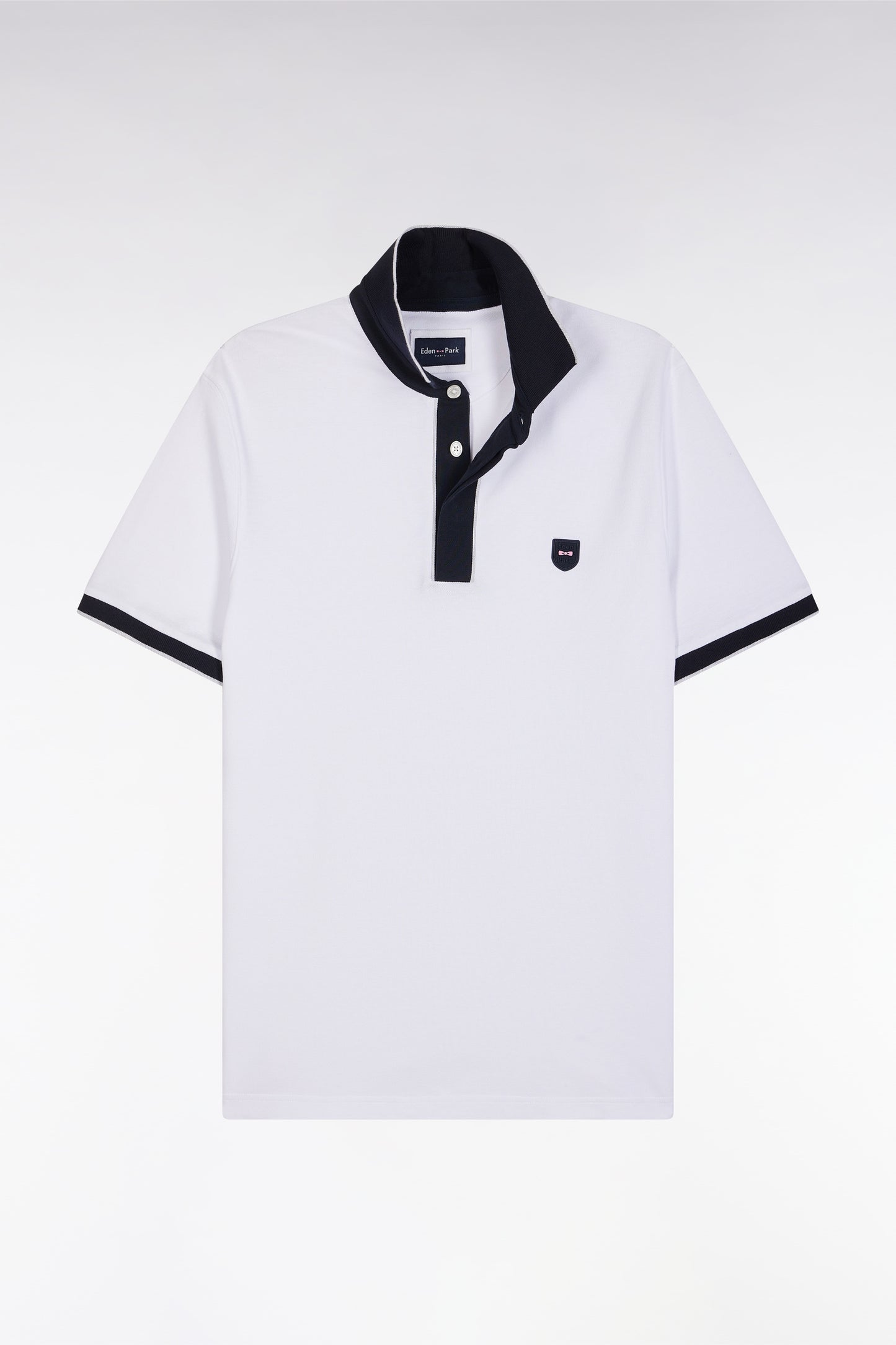 Polo uni à manches courtes en coton stretch blanc passepoil contrasté coupe ajustée