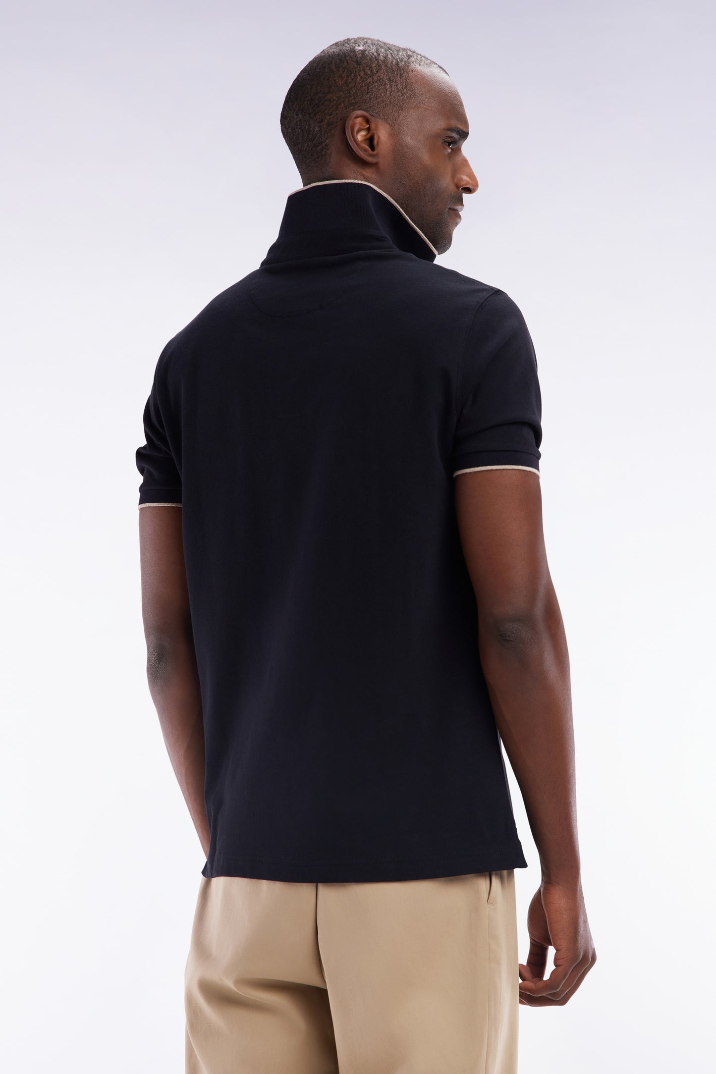 Polo à manches courtes en piqué de coton chiné stretch noir coupe ajustée