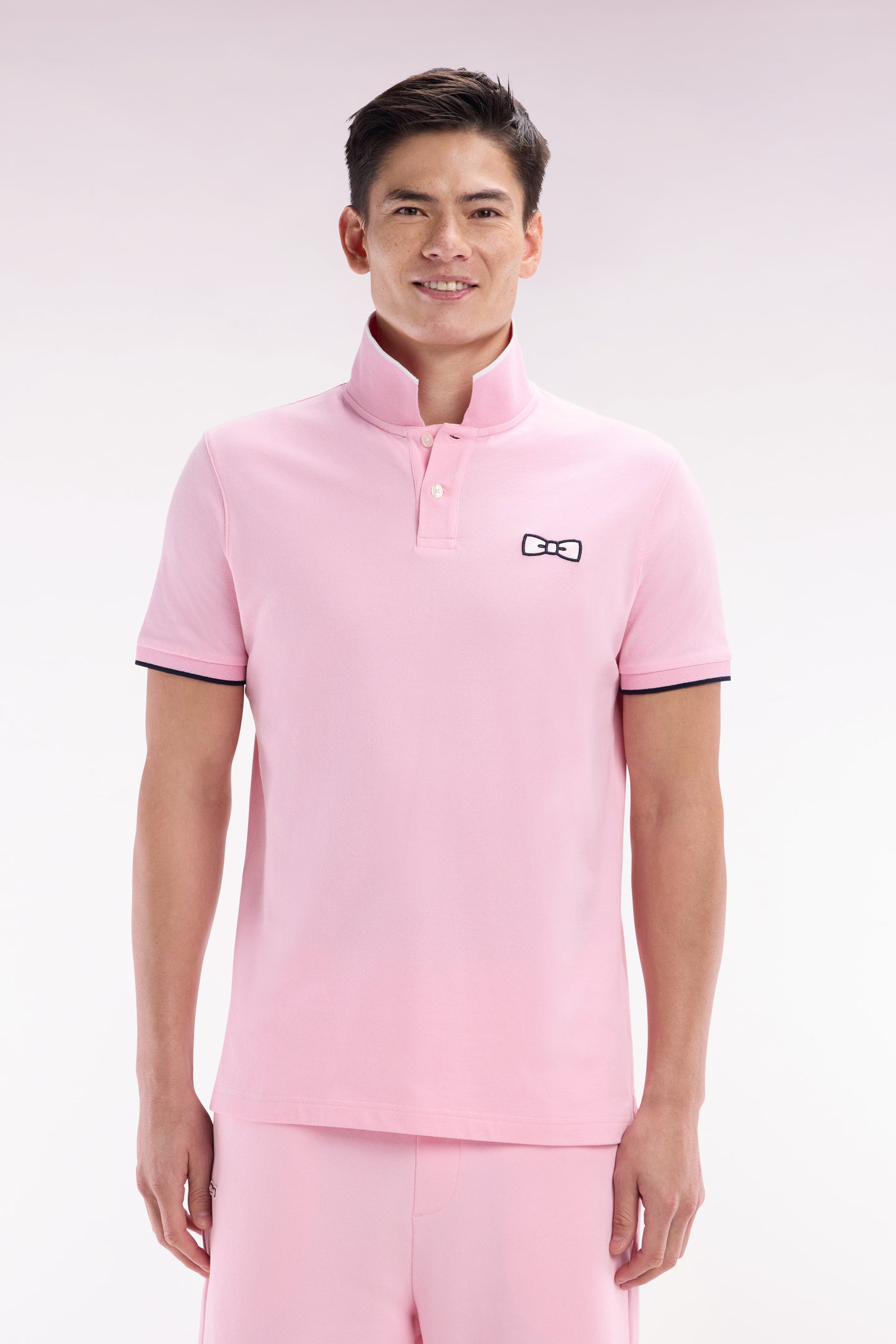 Relaxed-fit short-sleeved polo shirt in pink cotton with tone-on-tone embroidery
