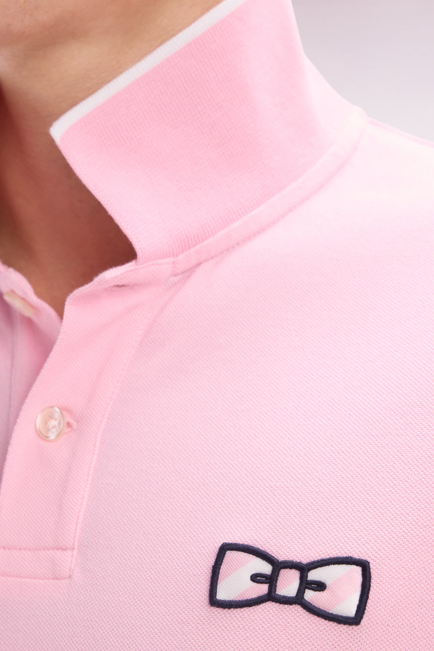 Relaxed-fit short-sleeved polo shirt in pink cotton with tone-on-tone embroidery