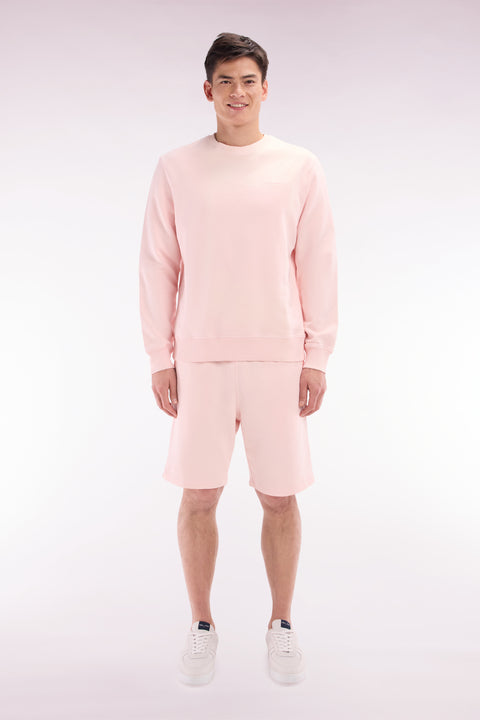 Relaxed-fit light pink cotton fleece shorts - Image 1