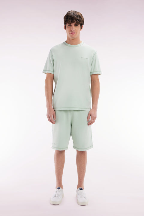 Relaxed-fit light green cotton fleece shorts - Image 1