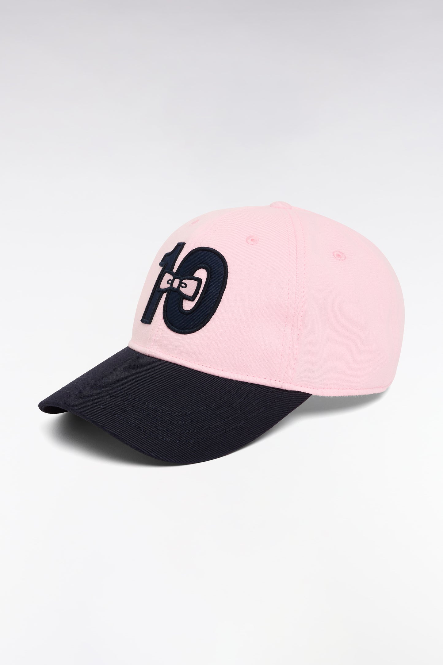 Casquette en coton bimatière rose et marine brodée