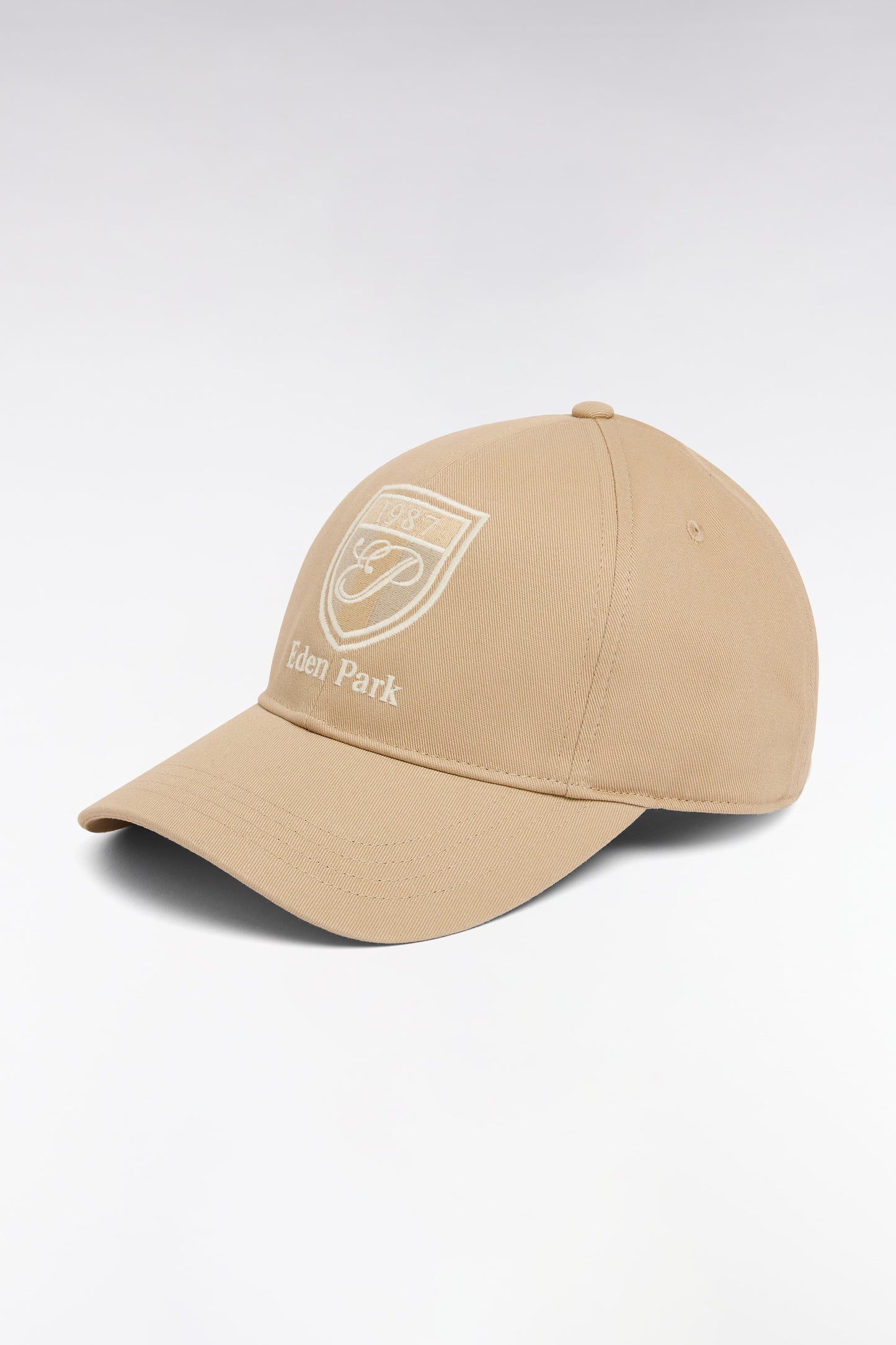 Casquette en twill de coton beige broderie écusson